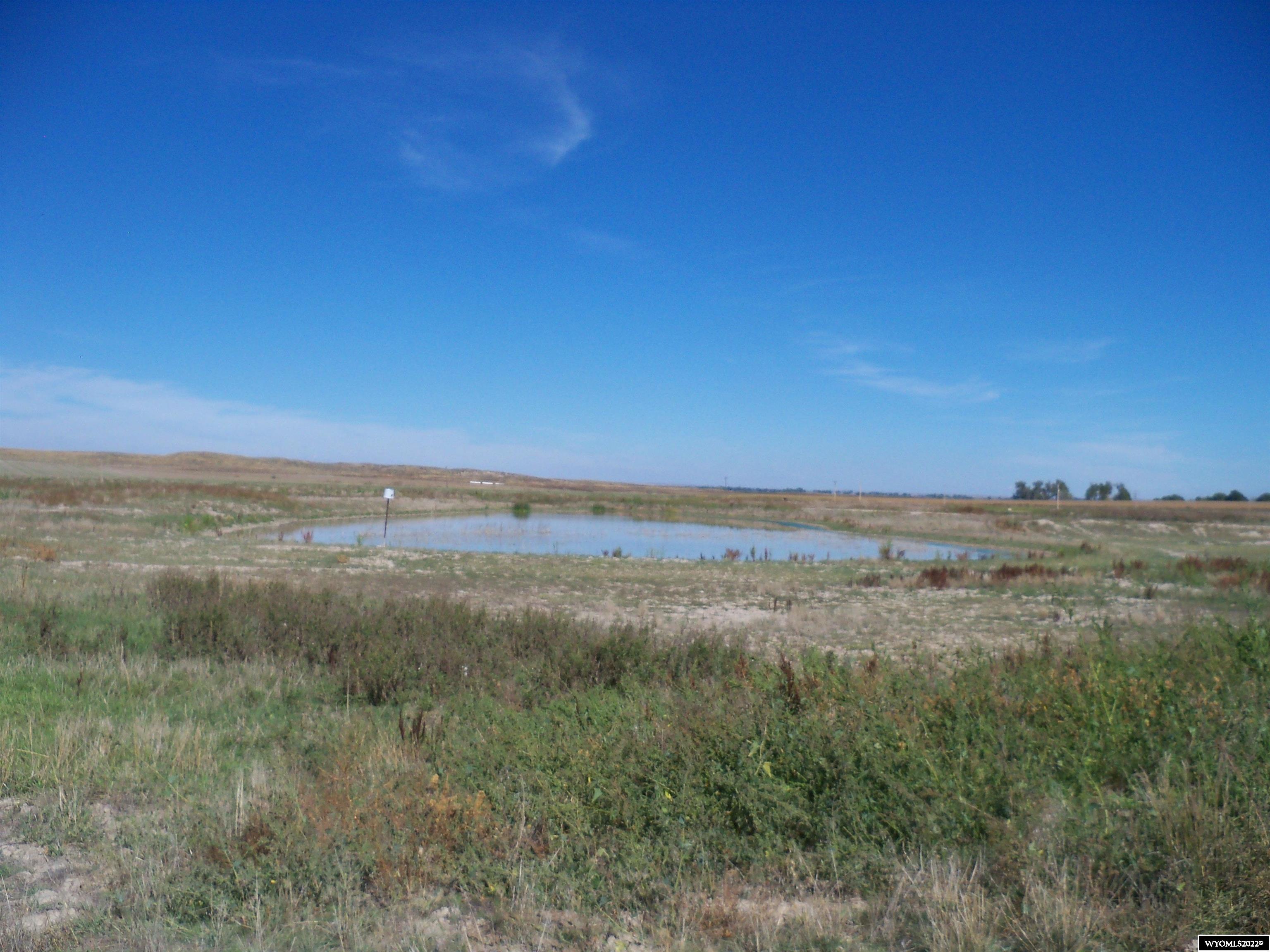 Great waterfowl and pheasant hunting on this property. Features a large fallible pond from the shared irrigation well. Would also make a great home site. Irrigated crop lands to produce abundant feed. Pond has an aerator for fish.