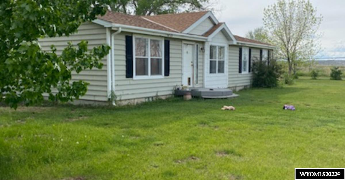 Manufactured Home  on permanent foundation with 4' crawl space.  Built on mud room with an amazing bathroom in the mudroom.  7 irrigated acres.  City water with the ability to switch to well water if it were ever necessary.  Sump pump in crawl space.  New hot water heater. Radiant heat not hooked up in the garage.  Seller offering to pay Buyer's closing costs up to $6,000 with acceptable offer