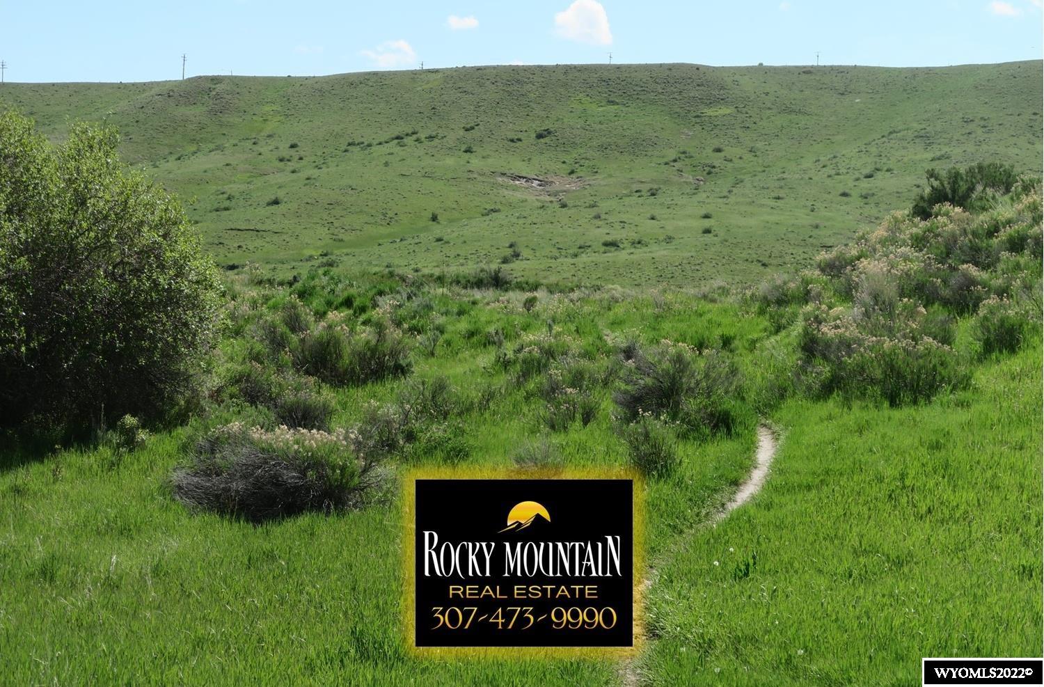 62+/- of Platted Residential Subdivision. Approved by city of Casper. Adjacent to Casper College and Mike Sedar Park. Lots of vegetation, multiple nice homesites with greenery and Casper Mountain view. Call Gary Lever for more information 307-247-1032.