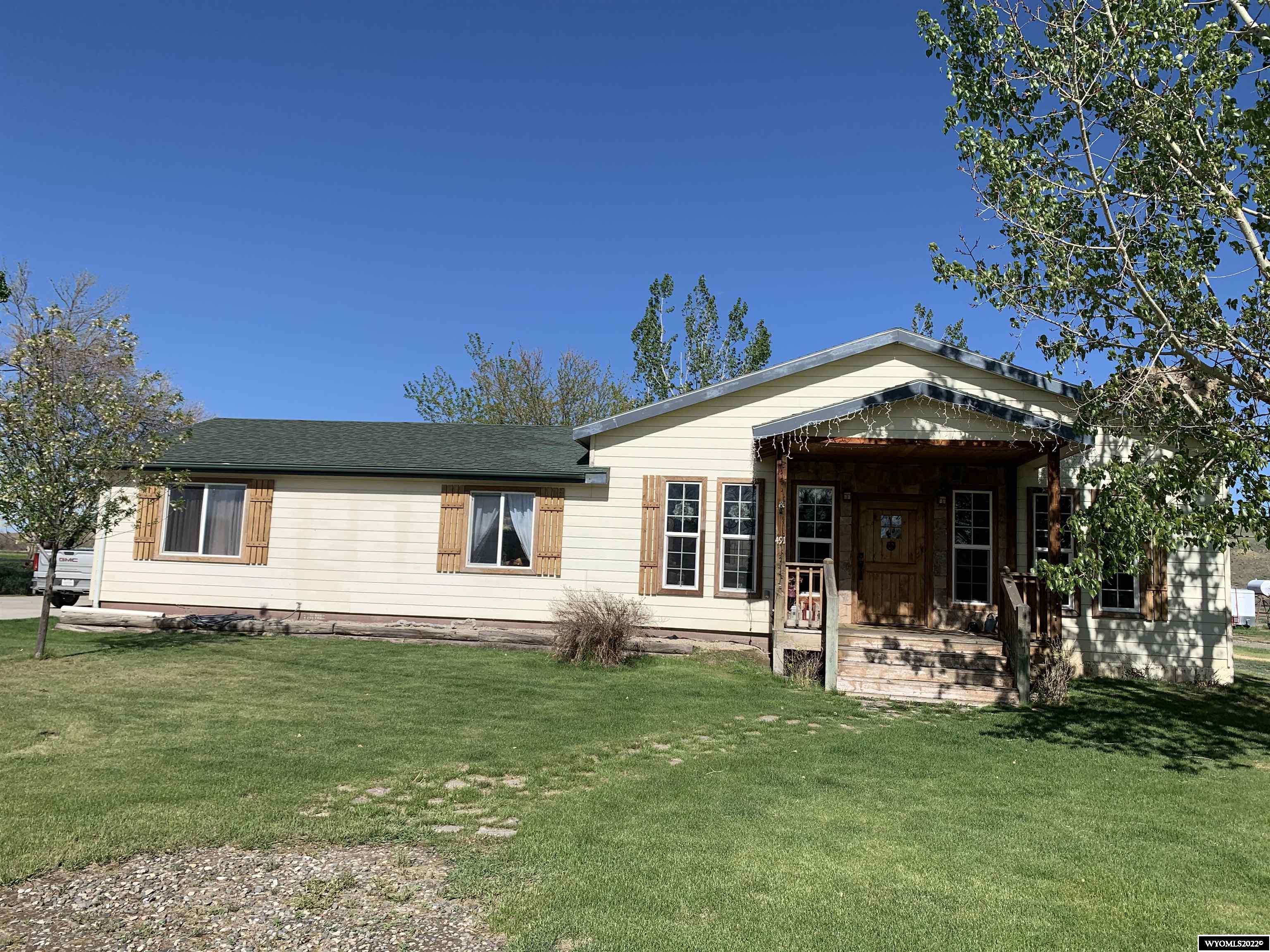 This a rare opportunity to own river front property along the Big Horn River. This immaculate home features two master bedrooms with ensuite bathrooms, and a large, open living space for entertaining and family gatherings. The property is beautifully landscaped, with an abundant amount of water for irrigating the pastures or expanding the green spaces around the property. It is set up perfect for livestock, and has a roughly 100 x 160 foot outside arena.