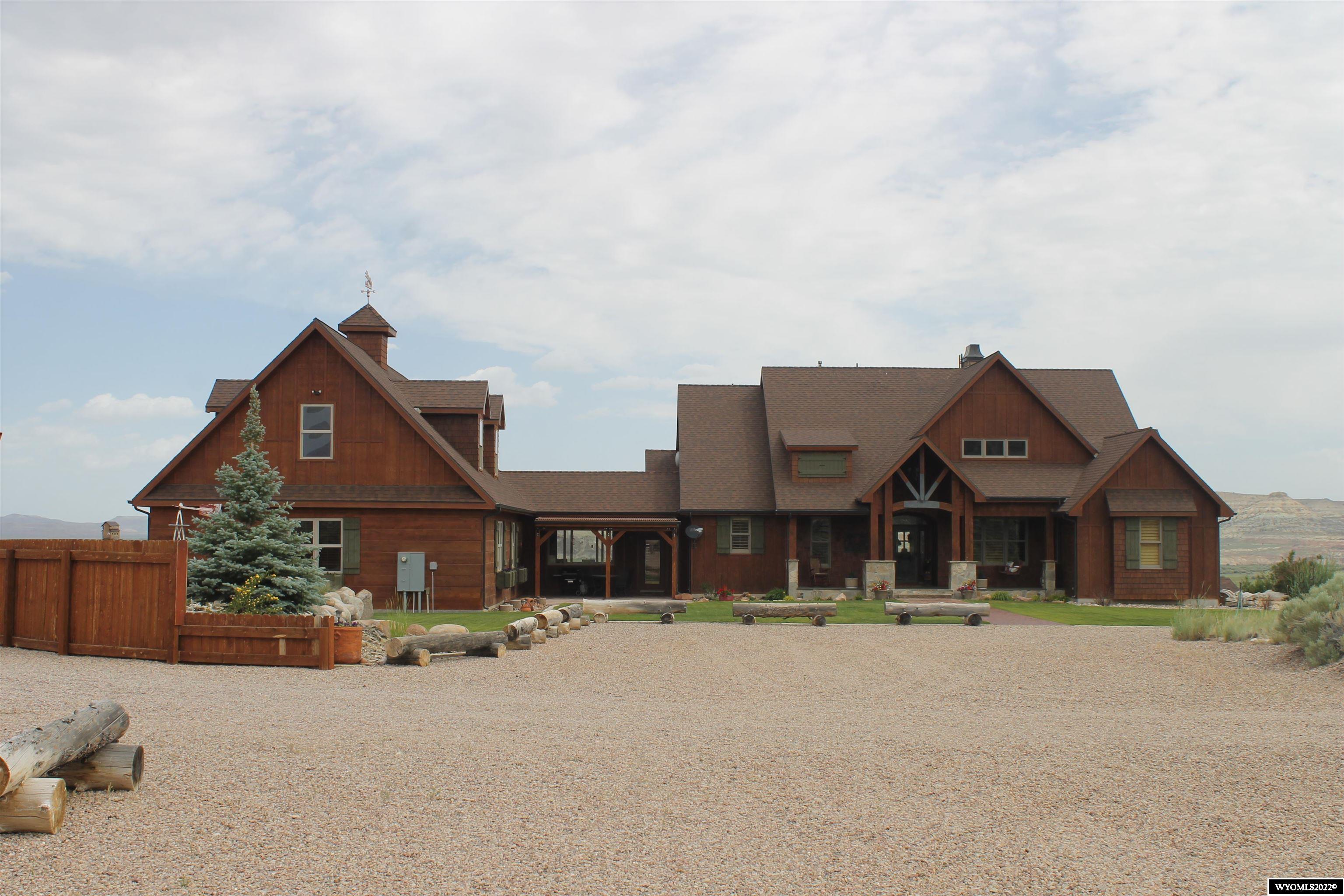 This custom home is located in an outdoor paradise area.  Within minutes you could be fly fishing the famous Green River or boating on Fontenelle Reservoir.  You could also enjoy hunting, riding horses or side by sides in the Wyoming Range. Rare find in this outdoor paradise. This 4800 square foot home has everything from 3 bedrooms and 4 full baths to a cedar sauna, workout room, and a separate bar area along with a formal dining room. The property could easily be split into upper and lower living areas for care taking or an upscale hunting lodge. The home offers a separate 3 car garage with an unfinished upstairs 1200 square foot living area.   There is also a separate shop and a craft shed.  The home has several separate rooms that could be used for offices, arts and crafts, hobbies or more rooms.  This is the perfect home to entertain fishing and hunting buddies or raise a family with country living.  The home has central air and a rock wood burning fireplace stretching to the ceiling.  You can go to either Jackson Hole Wyoming or Park City Utah ski slopes within a few hours or stay home and enjoy some of the best snowmobiling in the country.  Come see why this area is well known for its great fishing, big game hunting and recreation opportunities.   Green River Fly fishing boat launches within minutes Fontenelle Réservoir minutes down the road Wyoming Range for hunting Labarge Creek Elk Hunting Deer Hunting Moose Antelope Jackson Hole,Wy  approx 2 hours Park City,  Utah approx 2 Hours  Snowmobiling New Fork River Unlimited Blm and State Trust Land in the area Private airport 20 miles away.