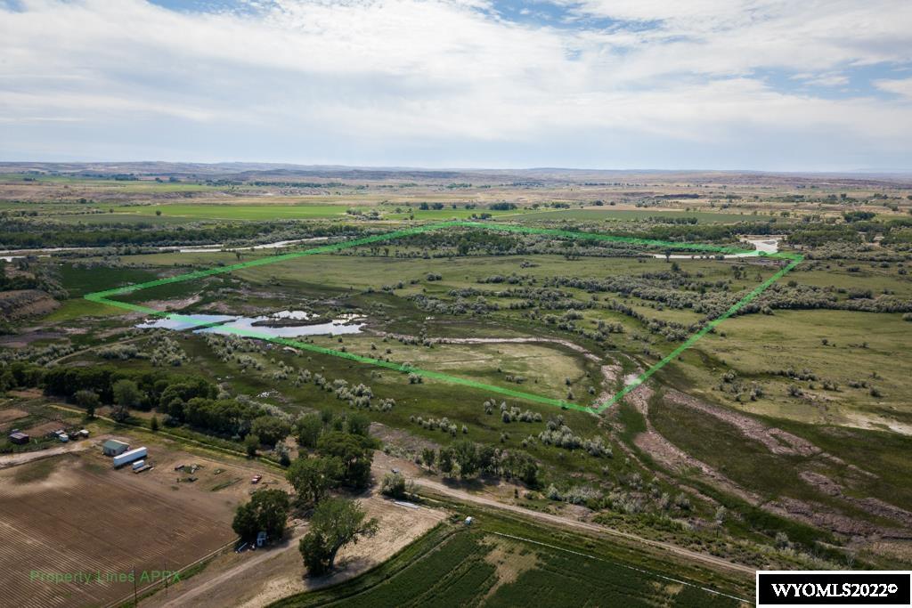 This gorgeous river bottom property is a recreational haven! From fishing to hunting this property offers it all. Currently being utilized for cattle grazing the property holds irrigation ground whos fees are paid partly by the oil field through Sidon irrigation. Come take advantage of this beautiful opportunity.