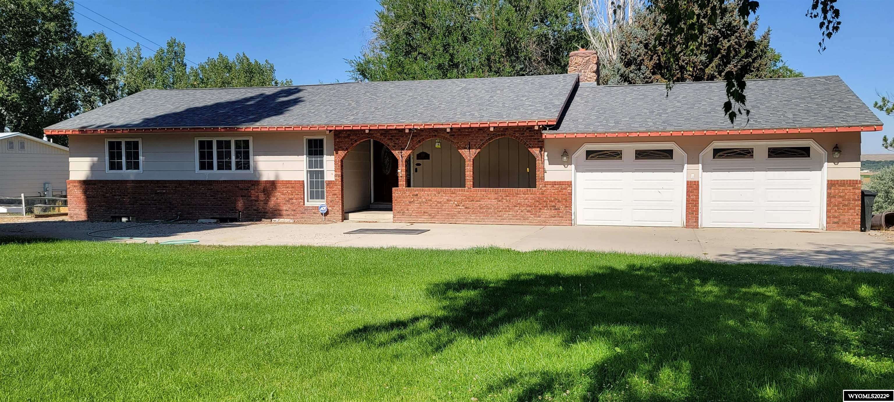 Excellent Location, backyard overlooking the Worland Valley.  4 bedroom, 3 baths.  Master Suite. Great utility room.  Wood burning fireplace, Newer Roof, 2-car Garage