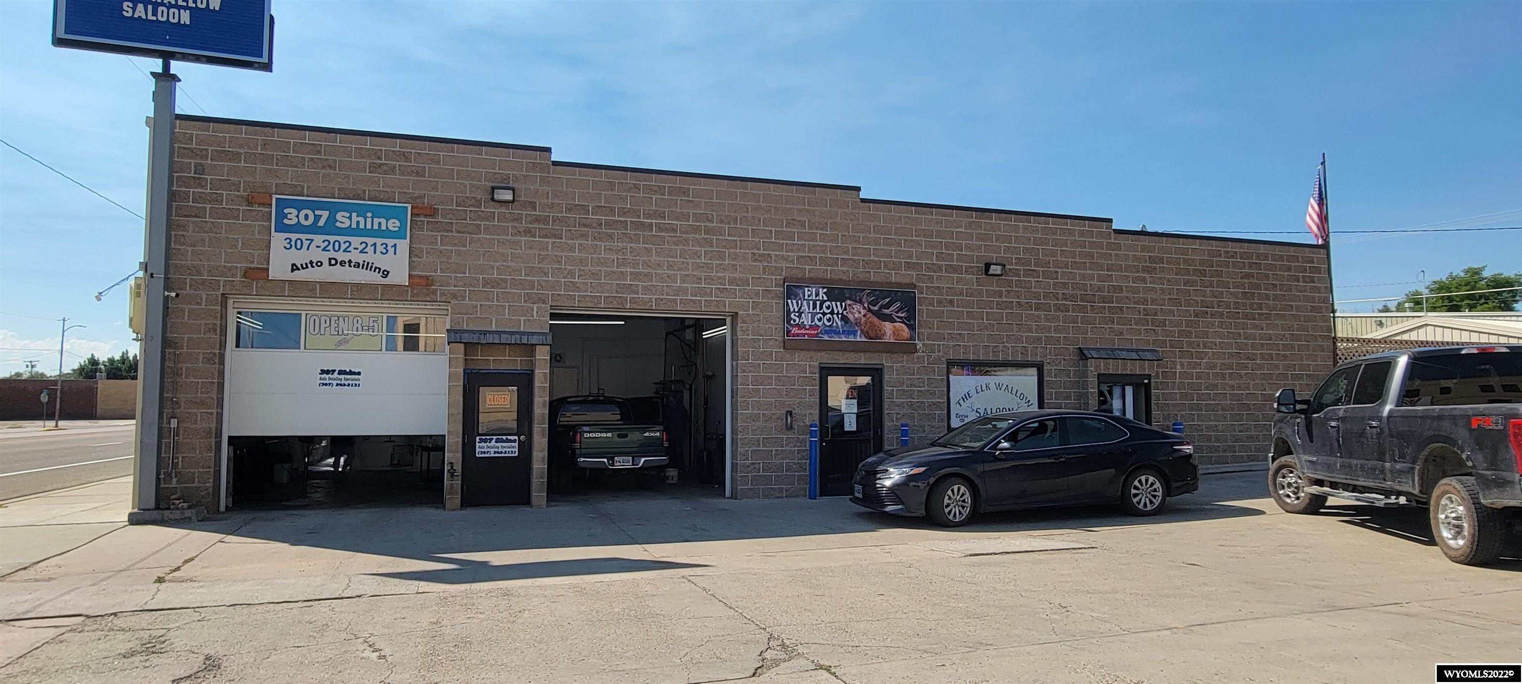 What a great business opportunity.  2 businesses plus 2 additional buildings that are currently rented or use as storage for yourself!  Full retail liquor license, drive through window, outside deck, lots of parking space.  Also included is a auto detailing business.  Possibilities are endless on this highly visible corner lot on US Highway 20