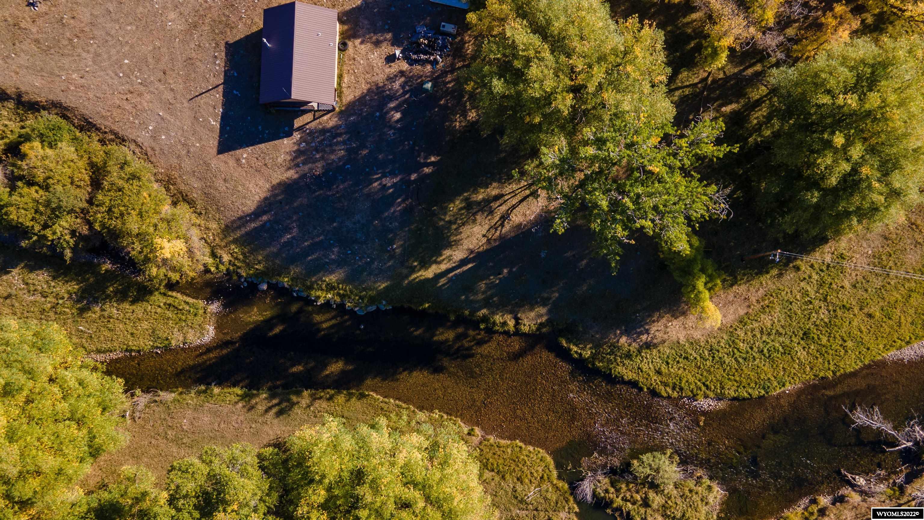 The Carpenter Ranch (Aka Piney Creek Ranch) is Located off US Hwy 14, in the green and scenic Piney Creek Area sporting 313+ Deeded Acres and 440 Acres of Lease State of WY Land, AND OVER 2,400 LN FT OF PINEY CREEK FLOWING THROUGH IT! This Property has over 2,400+ Ln. Ft.  of Piney Creek Flowing Through it, along with Territorial "Blanket Description" Water Rights (2.14 CFS for the Irrigation of 150 Acres) with a Priority Date of June 1885 and 3 Permitted Water Wells (2 Domestic and 1 Stock that is free flowing). The Seller's built a smaller Cabin in 2002, that is Beautiful – Kitchen, 1 Bedroom (Open Concept) and Full Bath. The Livingroom features a Wood Burning Stove, Wood Floors and Windows with the Views!  Loads of Options for Use of this Property: Home, Farm, Ranch, Vacation or ?? The Buyer's Choice.  The Purchase will include any/all Mineral Rights associated with this Property, owned by the Seller, if any, will transfer to the Buyer at Closing. Also included are the Air Rights, Generator, Stove/Oven, Refrigerator, Microwave and Some Furniture (defined by Seller).