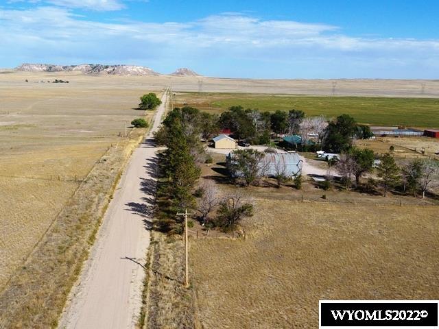 This is a 1,625.3 acre ranch that is close to town.  It has a center pivot that provides irrigated ground.  There is a good set of improvements. that includes a modern 4 bedroom, 2 bath home, a very nice 2 story barn with apartment in the top. Nice feed pens, loafing sheds. pole building, tack room and a show barn.