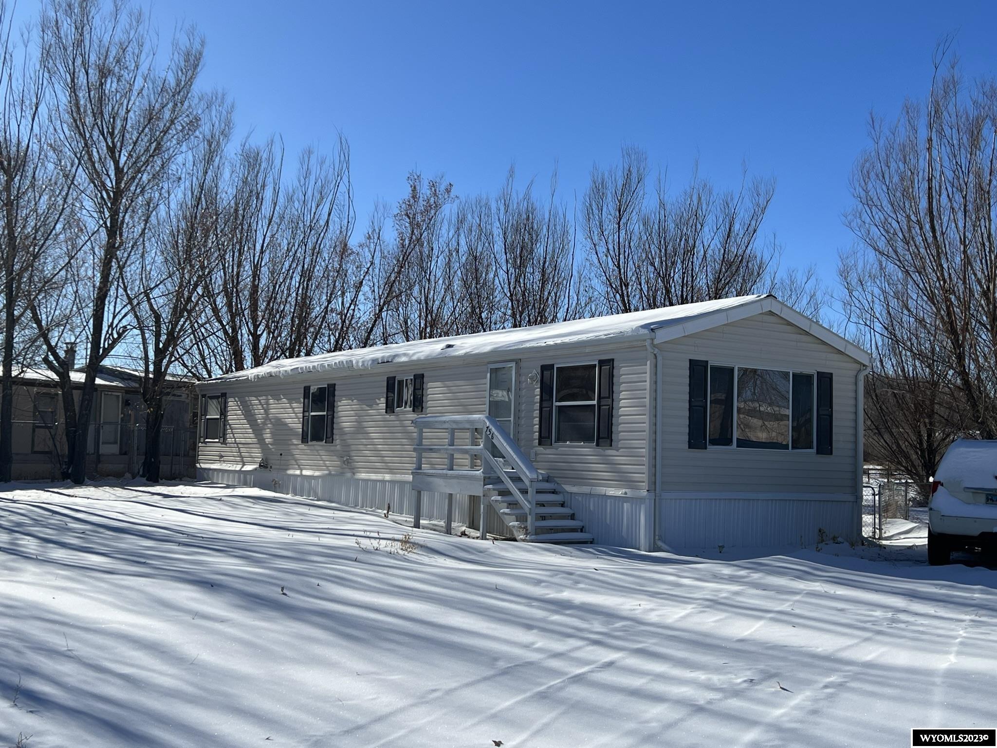 2002 2-bedroom manufactured home on a lovely lot in Basin, WY.  Open concept living room and kitchen area with lots of windows.  Primary bedroom has walk-in closet offering extra storage space.  Additional features include central air, metal roof, storage shed, and plenty of parking.  Don't wait on this great value!