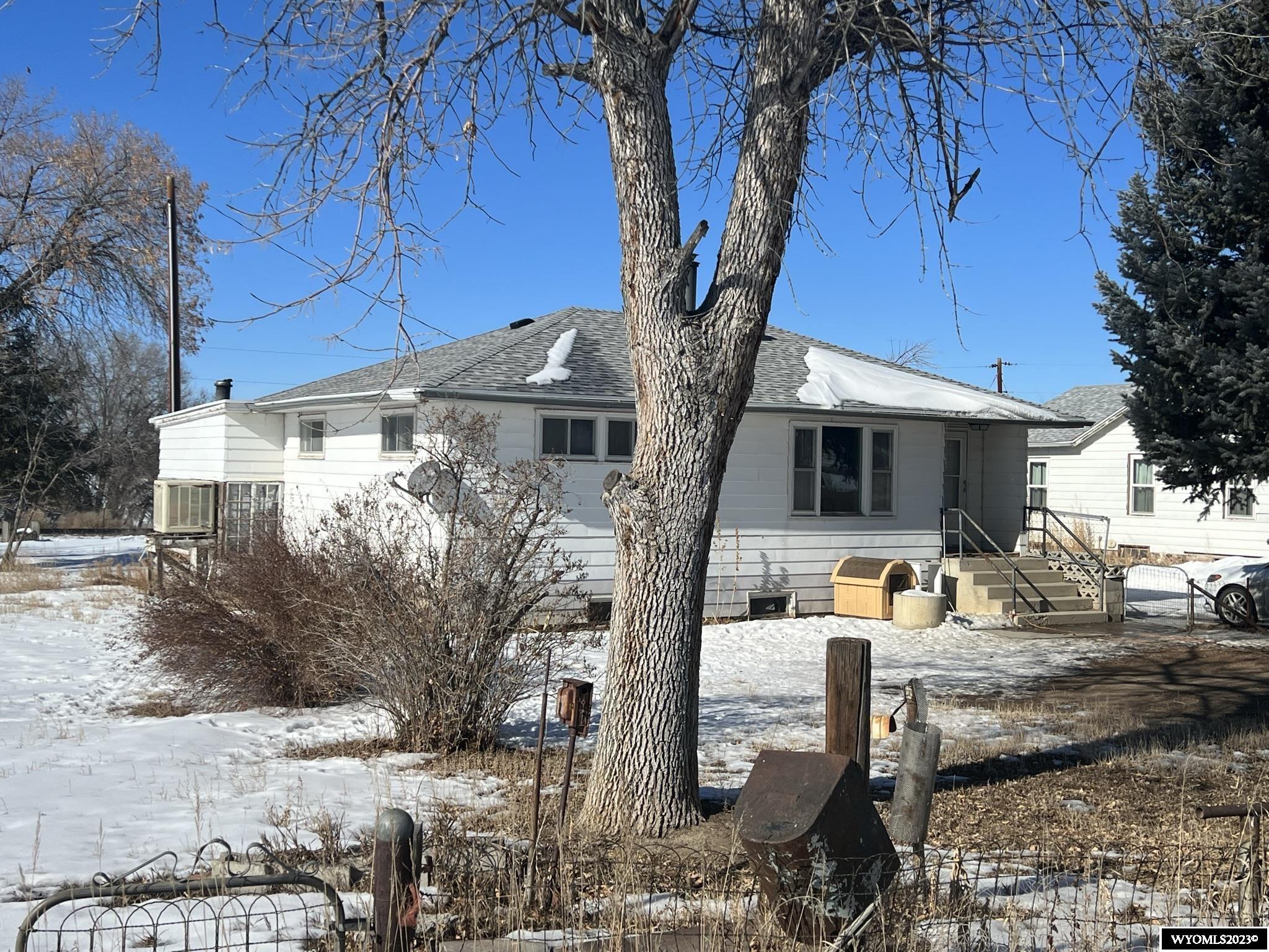 This listing includes a second home and 3.43 acres of level ground.  914 Highway 20 N has 2 bedrooms on main level, and an additional room in the basement currently used as a bedroom.  It also has a huge enclosed porch with a wood stove.  Both homes had roofs replaced 2 years ago.  912 Highway 20 N has been updated inside, with new plumbing, electrical, furnace, water heater, windows, drywall, paint, and laminate flooring.  This home is older (built in 1939) and has a partial unfinished basement. The 3.43-acre parcel sits adjacent on the north side of 912 Highway 20 N.  It is level and could be used for crops, livestock, etc.  The entire property has water rights from the Lower Hanover Canal.  This "package deal" is a great value - don't miss out on this one!