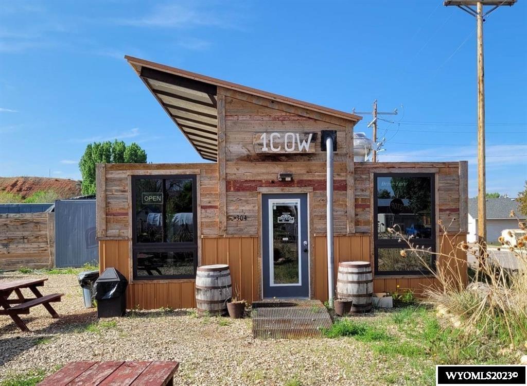 Business Opportunity!! Location is business and this one is ideal for a lot of it! Located in the heart of Ten Sleep Wyo. .39 acres  with established restaurant business. Equipped with nearly everything you'll need. 200amp 480v service and 600amp 120/240  service on site. Existing 300sq ft of refrigerated or freezer space. Inside and outside seating, drive-up, & off-street parking. Grill,  firers, grease trap, coolers and much more! This building is a certified state inspected butcher shop,certified through 12/31/23. It is also setup to be a bakery. Retail opportunity and Highway access at the foot of the Big Horn Mountains, roughly half way between the Black Hills & Yellowstone Park. Many possibilities and potential for your business ideas, not just the food industry. Come take look!