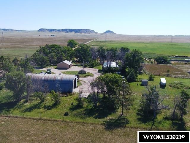 This is a complete ranch with 120-acre center pivot.  The improvements are very nice. It is located only 6 miles from the town of Lingle. This is part of the Rawhide Valley Ranch.