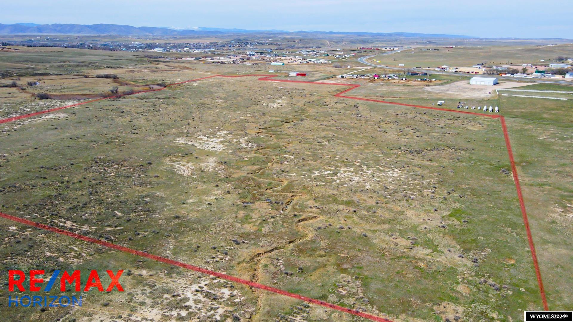 Unlock the potential of these 49.19 commercial acres with 3-phase electrical already available. Prime location offers ease of access and visibility. Explore the income potential through subdivision, with the added convenience of an existing easement. Don't miss out on this exceptional opportunity! Call Cody (307)351-1662 or Madeline (253)441-0310 at RE/MAX today!