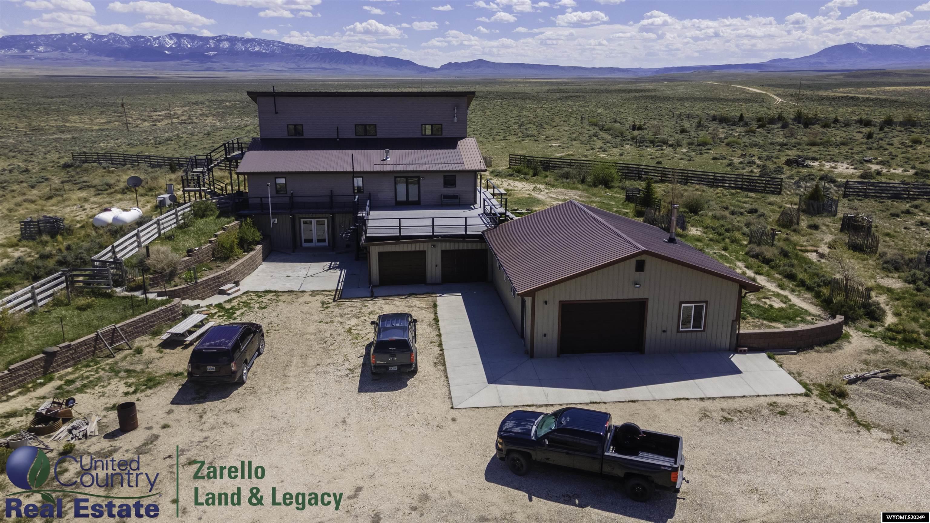 United Country Real Estate | Zarello Land & Legacy is proud to present Oregon Trail Ranch—a one-of-a-kind 80-acre Wyoming retreat offering modern comforts, rental income potential, and a connection to the historic American West. Just 75 miles southwest of Casper, WY, with easy access off Hwy 220, this property is perfect for those seeking a private ranch getaway, a hunting lodge, or an investment property with short-term rental potential. At the heart of the property is a 5,599 sqft custom-built home designed for both comfort and entertainment. With 5 bedrooms and 2.75 bathrooms, the layout is perfect for family gatherings, holiday retreats, or hosting guests. Thoughtfully built with ample natural light, and scenic views, this home is full of rustic charm. A 1,500 sqft bunkhouse duplex featuring two bathrooms and loft spaces provides a prime investment opportunity. Ideal as a seasonal rental for hunters, fishermen, or Airbnb guests, this space allows for passive income while maintaining the privacy of the main home.  Versatile Workshop & Garage Space:  1,500 sqft shop – Plenty of space for projects, equipment storage, or outdoor gear. 750 sqft attached garage – Secure parking for vehicles, ATVs, and boats.  Reliable Off-Grid Capabilities:  Whole-home 22kw Generac generator ensures uninterrupted power and peace of mind. Private well & propane utilities allow for self-sufficient living.  The Ultimate Outdoor Escape:  Hunting & Fishing – BLM land surrounds the area, with deer, antelope, and upland game birds frequent the property. Nearby, the Alcova and Pathfinder Reservoirs offer world-class fishing for trout and walleye.  Historical Significance – The Oregon Trail and Pony Express Trail run right through the property, offering a unique link to America’s pioneering past.  Scenic Adventures Nearby – Explore Independence Rock, Split Rock, and Martin’s Cove, or take a drive to Hogadon Ski Resort in Casper for winter recreation.  This turnkey ranch is a rural home for outdoor lovers, a potentially lucrative Airbnb or hunting lodge, or just a peaceful escape from city life. With its unmatched location, modern amenities, and historic charm, Oregon Trail Ranch is a rare opportunity you won’t find elsewhere.  Private Showings Available – Contact Derek Zarello at 307.337.9282, with United Country Real Estate | Zarello Land & Legacy.