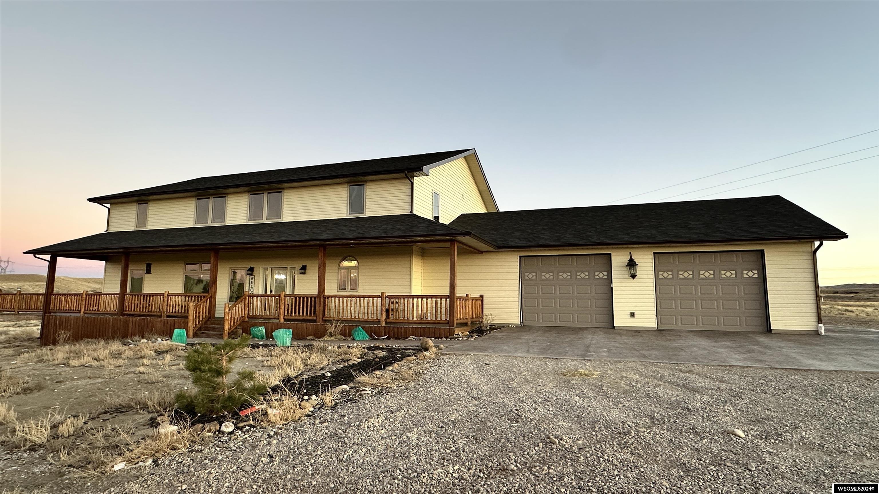 Attention HUNTERS AND FISHERS!! Country living at its finest in wonderful WyHOMEing! LOCATED AT HISTORICAL FORT STEELE, running along the Platte River, and bordering acres and acres of BLM land! Take the Fort Steele exit on the North side of the Interstate, cross the Ft. Steele bridge and follow the road, straight to the property! The County has Fort Steele as an extension of Sinclair, WY. This newly constructed, custom built open concept home, offers 8 bdrm 5 bath home with an extra large heated 2 car att garage comes complete with a huge equipment shop, a large barn and rests on 80 acres with miles of open road and open sky! The home includes 5328 sf of fully finished living space, an additional kitchen, cold storage room, family room and laundry room (YES! 2 KITCHENS AND A 2ND LAUNDRY ROOM!), plus 2 bedrooms in the basement. The master bed/bath on the main level with the spacious kitchen, dining room, home office (or bedroom), large laundry room with 2 sets of hook ups for washers and dryers! this home offers 3 sets of laundry hookups for ALL your "country livin' needs! Enjoy living close enough and far enough from town to embrace the privacy and farm life but have access to town for supplies, interstate access and all the comforts of home! Also enjoy your country living in the summer time drinking your morning or evening coffee sittin' out on the large wrap around porch or grilling out on your covered patio in the evenings or on the weekends! Additionally this home offers a fenced in property for your animals, a barn, and a spacious HEATED shop divided in 1/2 for all your storage zoned for either both commercial and rural living! Shop offers a loft for additional storage, even has a butcher station with running water for a potential buyer to harvest and process their own meat! Enjoy hunting, fishing and being in the country with nearby BLM access! Call Jenn Rothenberger for your tour and more information on this well planned and thought out home at (307)321-6895 today!