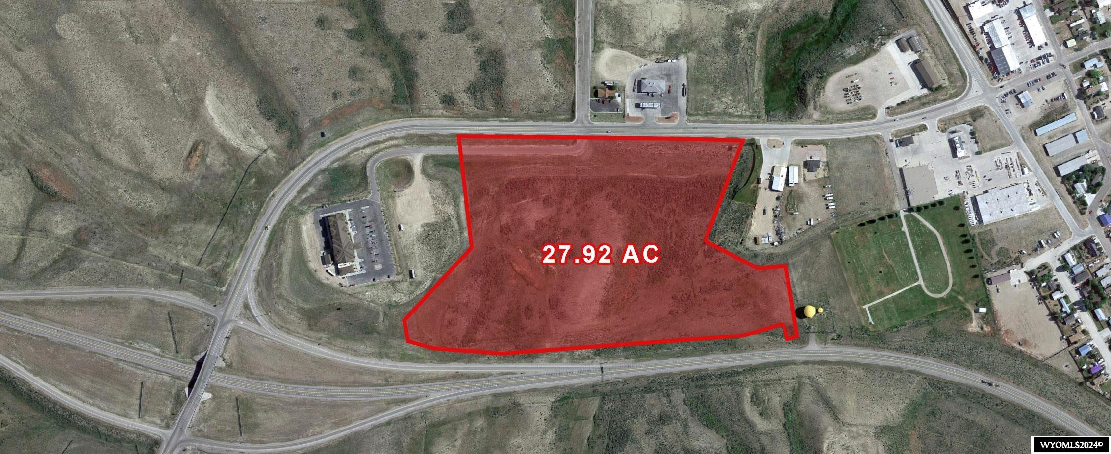 This is a rare opportunity for an expansive 28-acre property, located right off US-30 ALT in Kemmerer, Wyoming for savvy investors and developers. With the upcoming TerraPower Natrium Nuclear Power Plant—backed by Bill Gates—Kemmerer is poised for rapid economic growth.   This development will bring an influx of jobs and residents, increasing demand for retail, housing, and storage. This property is strategically positioned to capitalize on this growth, offering developers a prime location with strong potential for ROI.  Its strategic location near major transportation routes ensures excellent visibility and access, positioning it as a prime spot for commercial ventures or residential expansion.  In addition, there is a billboard on the property currently generating $100/month in revenue that could be a great value-add opportunity.  Don’t miss your chance to capitalize on Kemmerer’s promising future—this is your opportunity to be part of the city’s growth and success! See offering memorandum for additional details.