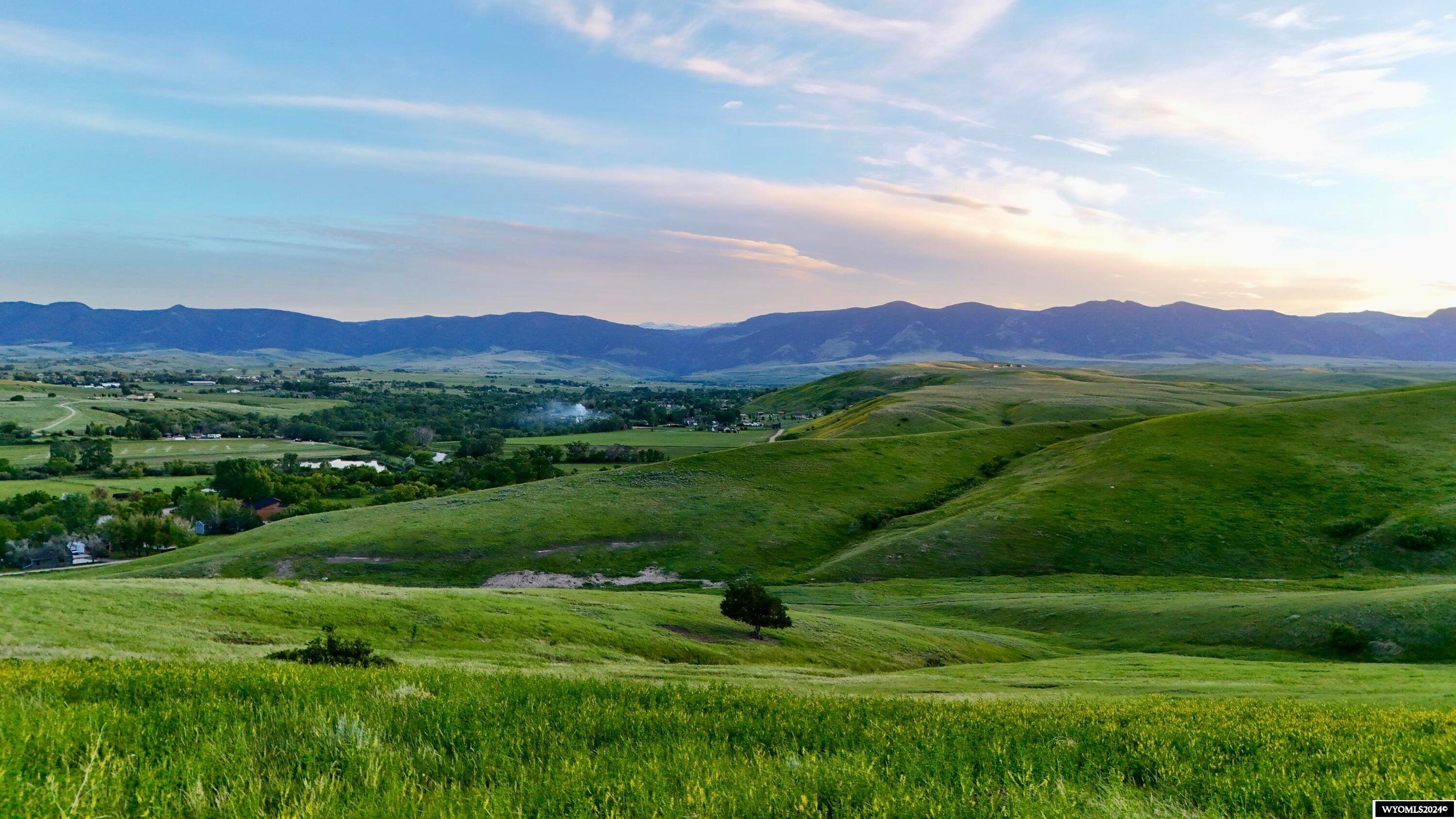 This expansive 114 ac parcel of western land offers a blank canvas of natural beauty and limitless possibilities. With ample acreage to roam and explore, this property offers more than just a place to build—it offers a lifestyle enriched by the beauty and serenity of the surrounding mountains. Located just minutes from downtown Sheridan, the property boasts numerous ideal building sites perfectly suited for creating your dream home or retreat all with panoramic views of the Bighorn Mountains. Enjoy watching the wildlife roam through the property from the comfort of your home or while out exploring the acreage this property offers. Whether you enjoy hiking, horseback riding, running, or atv recreation, you can get out and enjoy this land in privacy.