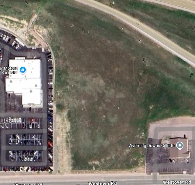 This 3.69-acre commercial lot sits in a high-visibility area near schools, residential neighborhoods, and main roads—perfect for retail, office, or mixed-use development. Located in Gillette’s growing Westover district, the lot is fenced, level, and offers public water access with sewer nearby. Zoned for commercial use, this property is ideal for businesses looking to expand in a thriving community. With increasing growth in the area, this is your chance to invest in one of Wyoming’s most dynamic markets.