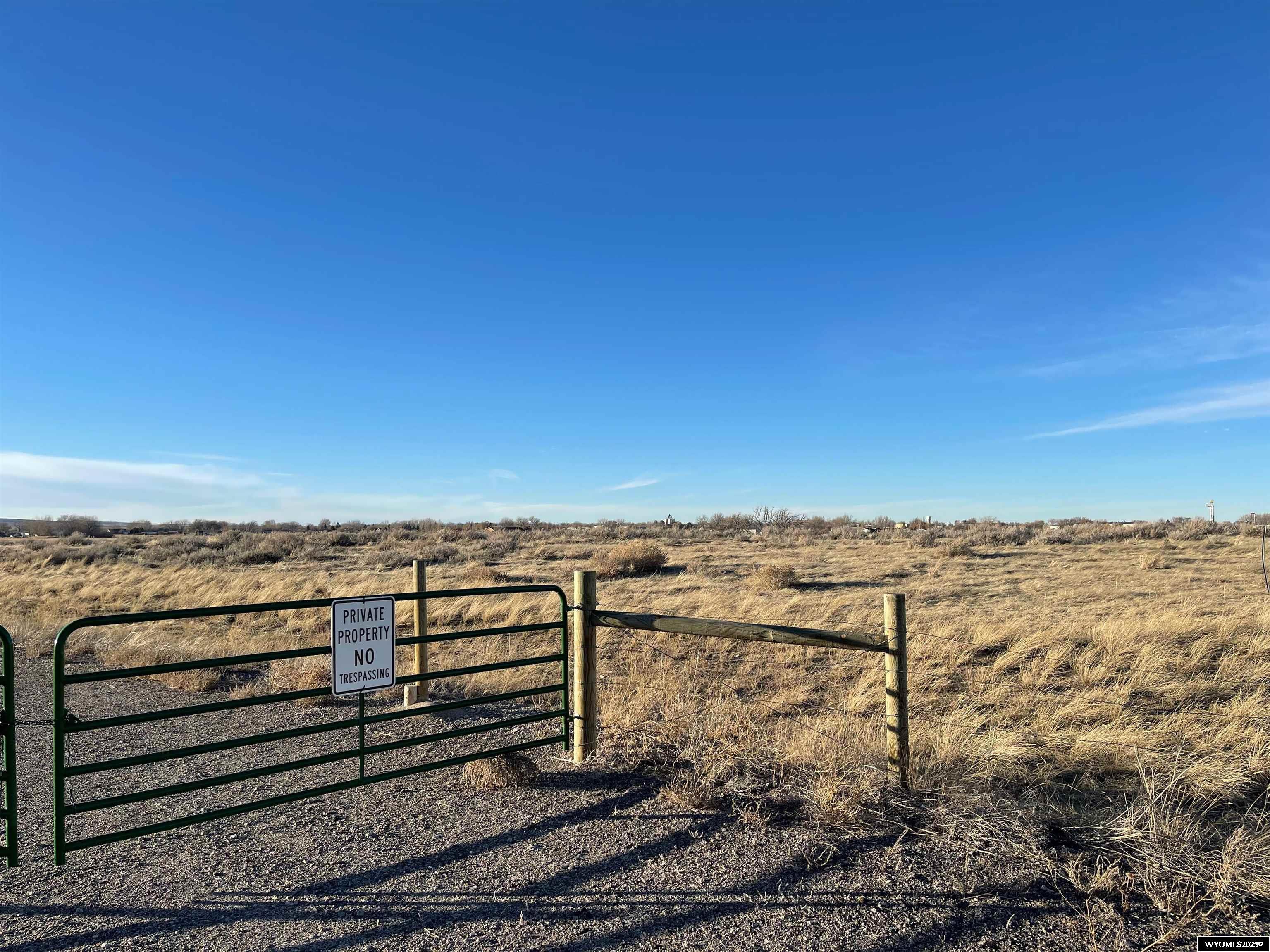 Located off Robertson road this rare large acre property features approximately 122 acres of county land close to public services. The parcel features 60 irrigated acres and offers endless opportunities. With room for horses, riding areas, barns, shops and more you can make this private oasis suite your needs. Utilities are near by and offer ideal access to the bypass, west casper retail and I-25 while offering unique privacy and tranquility.