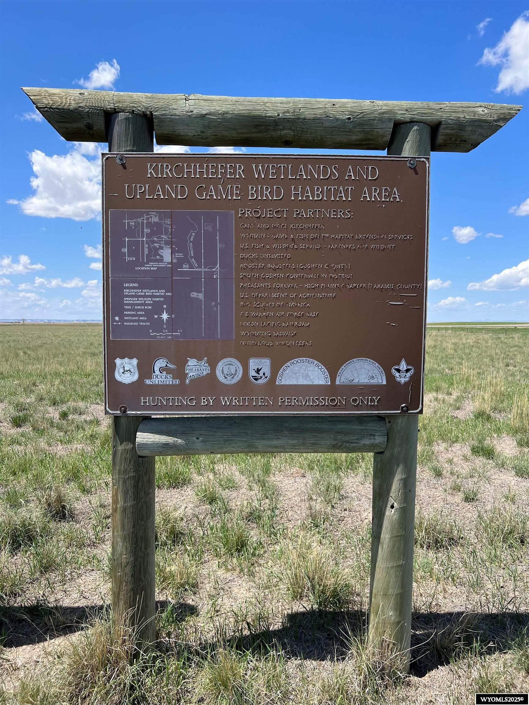 This 379-acre parcel of land offers a rare opportunity to own a prime piece of Wyoming hunting property. Located just 13 miles from Torrington and minutes from the scenic Hawk Springs Reservoir, this property is a haven for game bird hunting, featuring a blend of wetland and upland game bird habitat.  Currently enrolled in a USDA Conservation program, the property includes a transferable contract, allowing the new owner the option to continue its conservation efforts. The land has been thoughtfully developed, with ponds dug and numerous trees planted to enhance both wildlife habitat and the landscape.  Whether you're seeking a quiet retreat for outdoor recreation or looking to maintain a legacy of conservation and hunting, this property is a unique and valuable investment in Wyoming’s rich natural heritage.