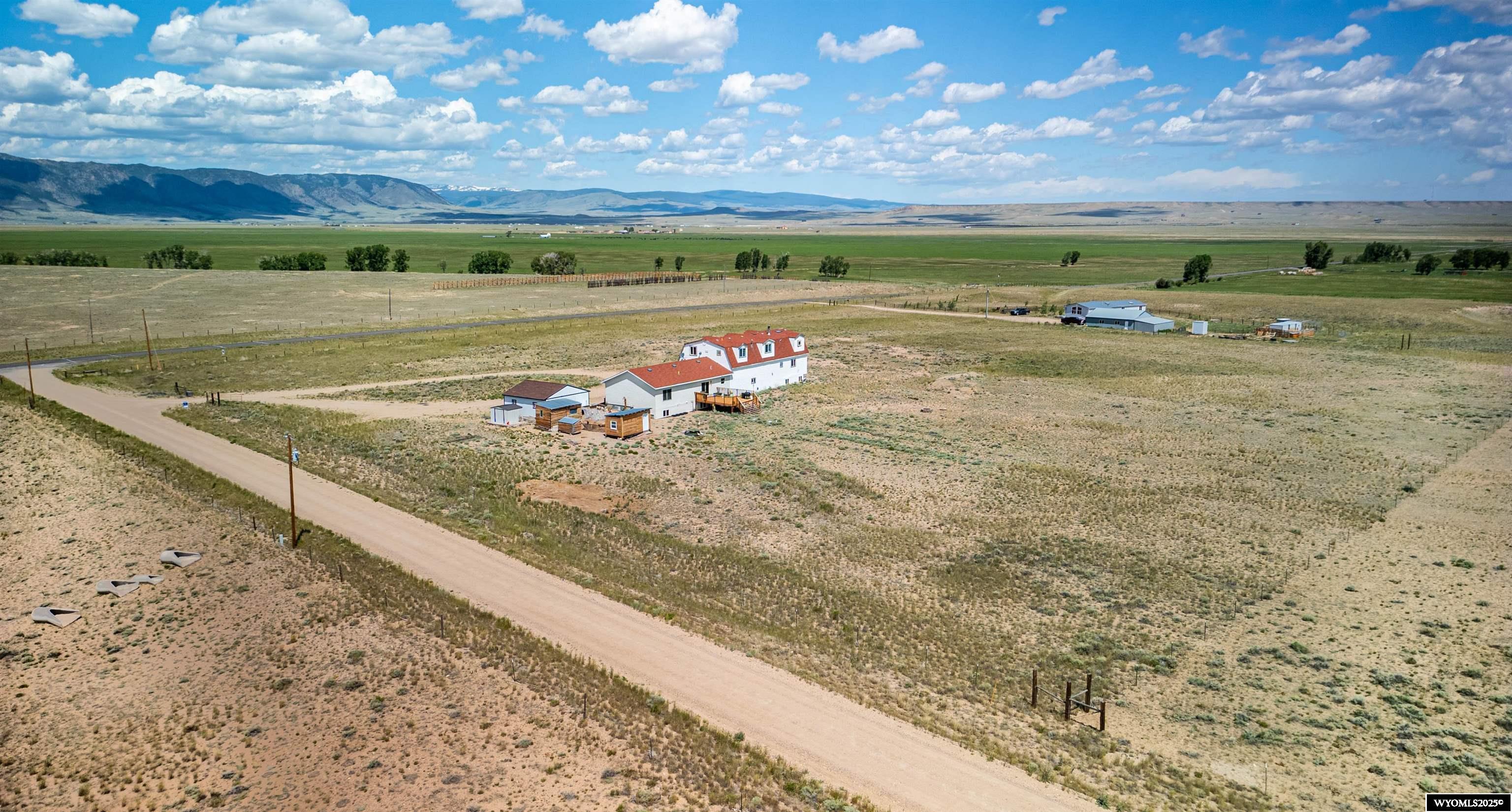 Introducing 16 Mortensen Ln, Laramie, WY - A Unique Ranch Retreat   Nestled on 9.55 acres, this extraordinary property boasts breathtaking views of the Wyoming skies and surrounding landscapes. With over 5,000 sqft of living space, this single-unit residence features natural wood trim, Anderson windows, and an attached heated 3-car garage.   Perfect for animal lovers, this property is set up for horses or livestock, with ample space for corrals, barns, or other outbuildings. Plus, with no covenants, you have the freedom to use your land as you see fit.   Additional features include:  - Detached 2-car garage for extra storage or workspace - Private well with potable water - Carbon County electric and Walden gas - Paved and maintained roads - Breathtaking views of Wyoming skies and surrounding landscapes - Nearby access to multiple lakes, including Mortensen Lake, Meeboer Lake, Lake Hattie, and Twin Buttes Lake - Abundant hunting opportunities in areas 45 (antelope), 76 (deer), and 9 (elk) - 9000 acres of state land and 1700 acres of US forestry land nearby, perfect for hiking, fishing, and exploring   While this property is turn-key and ready for immediate occupancy, it also offers room for improvements and customization within the unfinished basement.  Don't miss this rare opportunity to own a piece of Wyoming paradise.