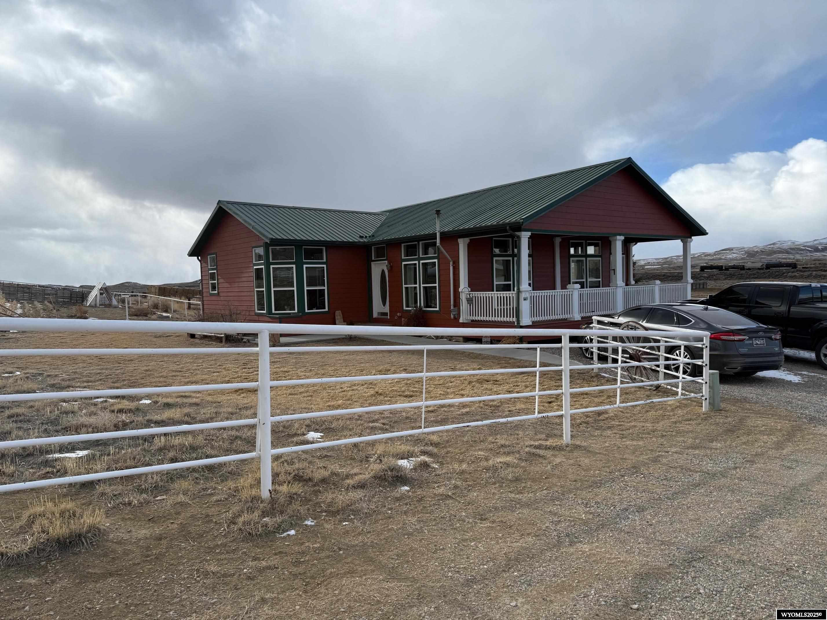 Soak up all the natural beauty surrounding this property located on 215.93 Acres!  This has everything you would want is in this country property just outside of Rawlins.  Large home built in 2007 features 5 bedrooms and 3 bathrooms, metal roof, central air conditioning, a covered porch, and deck.  Home has new windows, new exterior paint and walk out basement.   Kitchen includes stainless appliances.  Large Master Suite with walk in closet and soaker tub.  Fenced property includes numerous corrals and outbuildings including, Equipment Building 2016 square feet, Calving Barn 960 square feet, barn 1440 square feet, loafing shed 345 square feet, loafing shed 250 sq feet, and newer Shop built in 2021 is 7200 square feet.  Shops are both heated and insulated.  The Larger shop has 60x48 is that is finished and has 1 overhead door 16'x16', and 2 walk in doors.   Call Veronica Pell to tour this one-of-a-kind property.