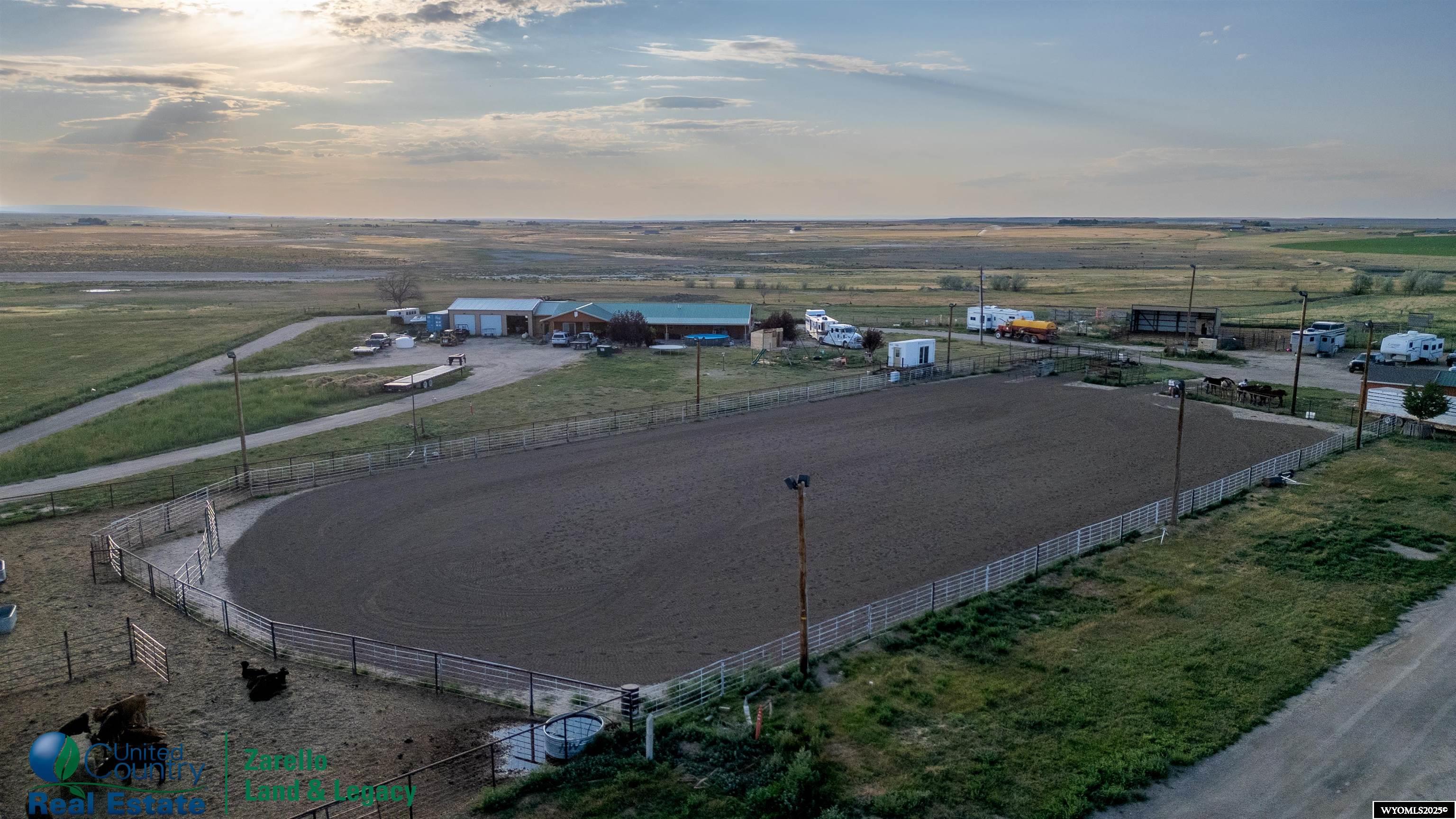 United Country Real Estate | Zarello Land & Legacy are pleased to welcome you to the Sadler Ranch.  Located just 20 minutes from downtown Casper, this 160-acre ranch features a 2,821 sq. ft. home with 5 bedrooms, 3 bathrooms, radiant in-floor heat, and a newly remodeled primary bath. A breezeway connects the home to a 1,200 sq. ft. shop with three 12’ roll-up doors.  The land includes 100± irrigated acres under a 6-tower Zimmatic pivot (Alcova Irrigation District, 80 Acre/Feet), and 60± acres of dryland grazing. Hay yields average 3–4 tons per acre per cut, with 2–3 cuts annually.  Equestrian amenities include a 145' x 240' roping arena with lighting, catch pens, return chute, an announcer's booth, tack shed, and three loafing sheds.  Income-producing features include 6 RV hookups with water and power, plus established event infrastructure. A canal-fed pond adds additional utility and charm.  This ranch blends productivity, versatility, and proximity to town—ideal for equestrian use, hay farming, or rural retreat.  For more information or to schedule a private showing, call Derek Zarello with United Country Real Estate | Zarello Land & Legacy at 307.337.9282.