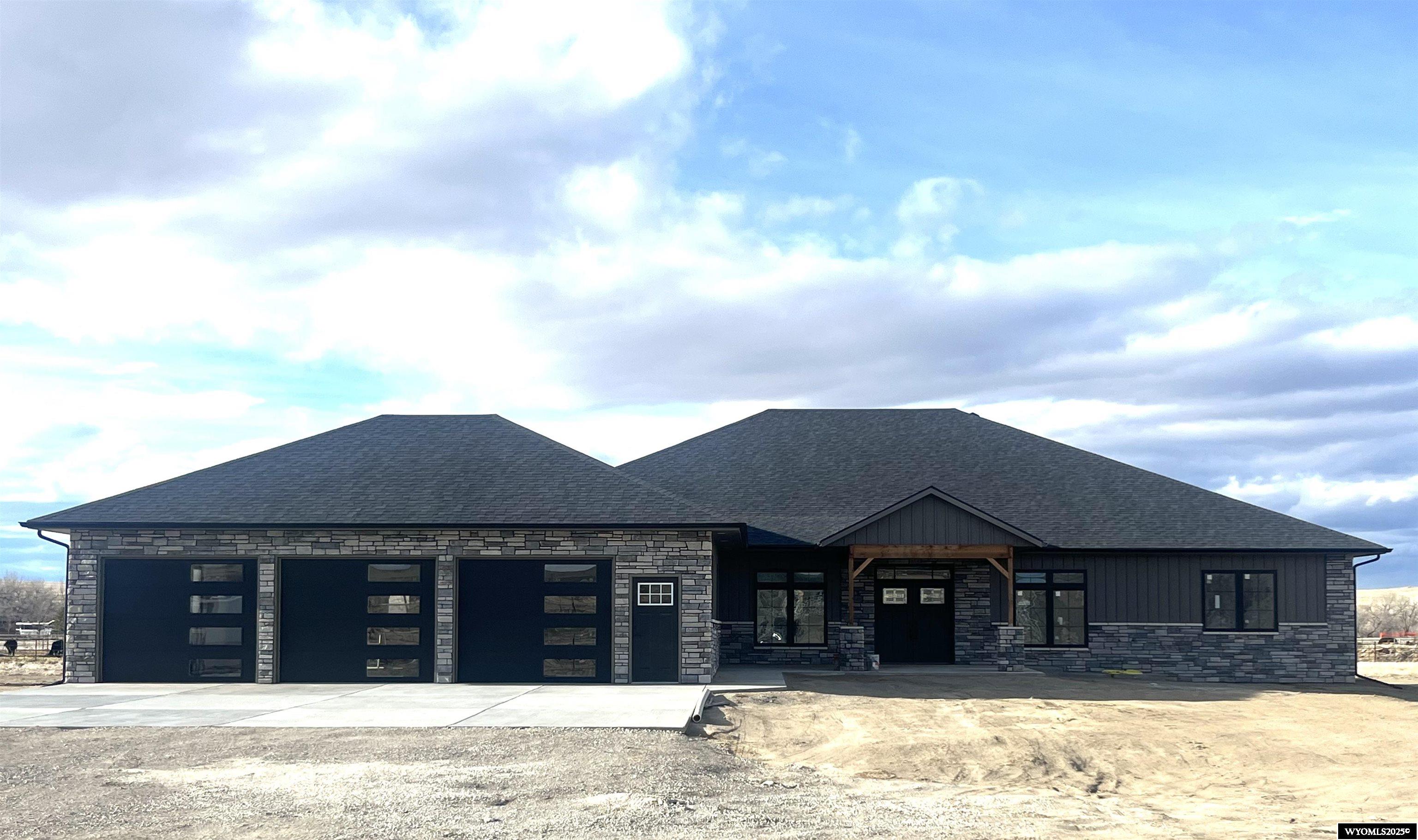 ABSOLUTELY gorgeous one level home with MORE THAN 4,000 square feet.  Open and airy, this great floorplan features covered back patio, living room PLUS family room.  Great split bedroom plan, roomy laundry room complete with DOG BATH!  Build this beautiful plan OR, builder/seller will build YOUR plan!  Call Lisa Burridge at 307-259-3631 for more information on how you can own your dream home in Meadow Acres!