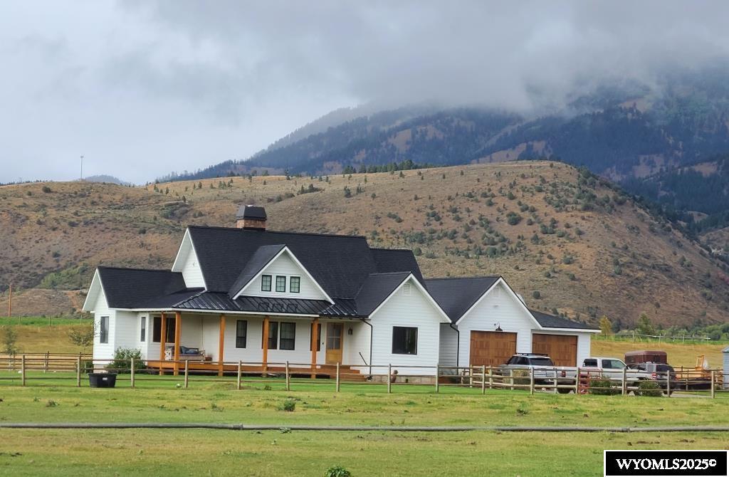 Custom Modern Farmhouse in Star Valley, WY  - Main Level Master Suite (vaulted) - 9/10 ft Ceilings and 2x6 Construction - Pella Windows & Doors - Professional Kitchen & Appliances - Full finished basement - Walk in Pantry/Back Kitchen - Private Office & Gym - Sonos Central Sound System - Dual Dishwashers, Laundry and Water Heaters - Propane Range/oven - Covered Porch - Cove Zone, Wood and Pellet Stove Heat - 10 ft Garage Doors - 300 Amp Service with Generator Transfer Panel - 45' x 36' Barn with Stalls, Tack/ Shop Space - Large Fenced Yard - Private Well & Septic - Treated Post & Rail Fencing with Pastures & Gates Throughout - Fenced/Gated Chicken Coop & Garden Area - No HOA or CCR's - Pressurized Irrigation