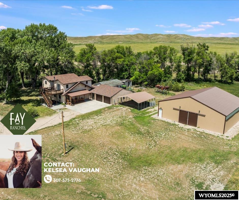 Welcome to the Diamond Bar Ranch in Lingle, Wyoming—an exceptional 88.1± acre property perfectly suited for horse enthusiasts and those seeking wide-open spaces with modern comforts. This beautifully maintained ranch features 5 acres of valuable water rights, multiple fenced pastures, and everything you need for a functional and comfortable country lifestyle.  At the heart of the property is a spacious 3,752 sq ft home offering three bedrooms, two bathrooms, and two expansive family rooms—ideal for entertaining or relaxing with loved ones. Enjoy the warmth and charm of a beautiful wood-burning stove, perfect for cozy winter nights. The home boasts numerous updates, including new flooring, a remodeled bathroom, reverse osmosis (RO) system, and well upgrades, ensuring both style and reliability. An oversized attached two-car garage and a 20x20 carport provide plenty of room for vehicles and equipment.  Equestrian facilities include an impressive 80x100 riding arena, three individual runs with windbreaks, several fenced pastures, and a massive 50x50 shop with brand-new electrical completed in 2025—ideal for all your tools, projects, or livestock needs.  With exceptional year-round access, this property combines the best of rural living with convenient connectivity. Whether you're a serious rider, hobby farmer, or simply looking for a peaceful retreat with room to roam, this turnkey property checks all the boxes. Don't miss your chance to own one of Goshen County's most well-equipped and versatile ranches!