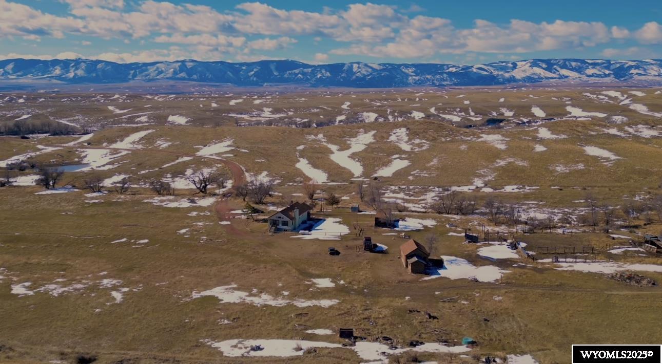 Looking for the Wyoming dream? This property is a RARE OPPORTUNITY - vast acreage, neighboring State Land, multiple ponds, plus a 3 bedroom home with full basement, wood fireplace and wood stove, forced air propane heat with central air. Enjoy expansive acreage, spanning over 714 acres providing opportunities for ranching, hunting and creating your own piece of heaven. With ample space to roam, you can enjoy multiple ponds scattered throughout the property with North Fork Early Creek on it. Luxury of STATE LAND as your neighbor and a 1920 original homestead on the property with a tack shed. Experience panoramic views, a natural masterpiece and perfect backdrop for daily life and haven for wildlife enthusiasts!