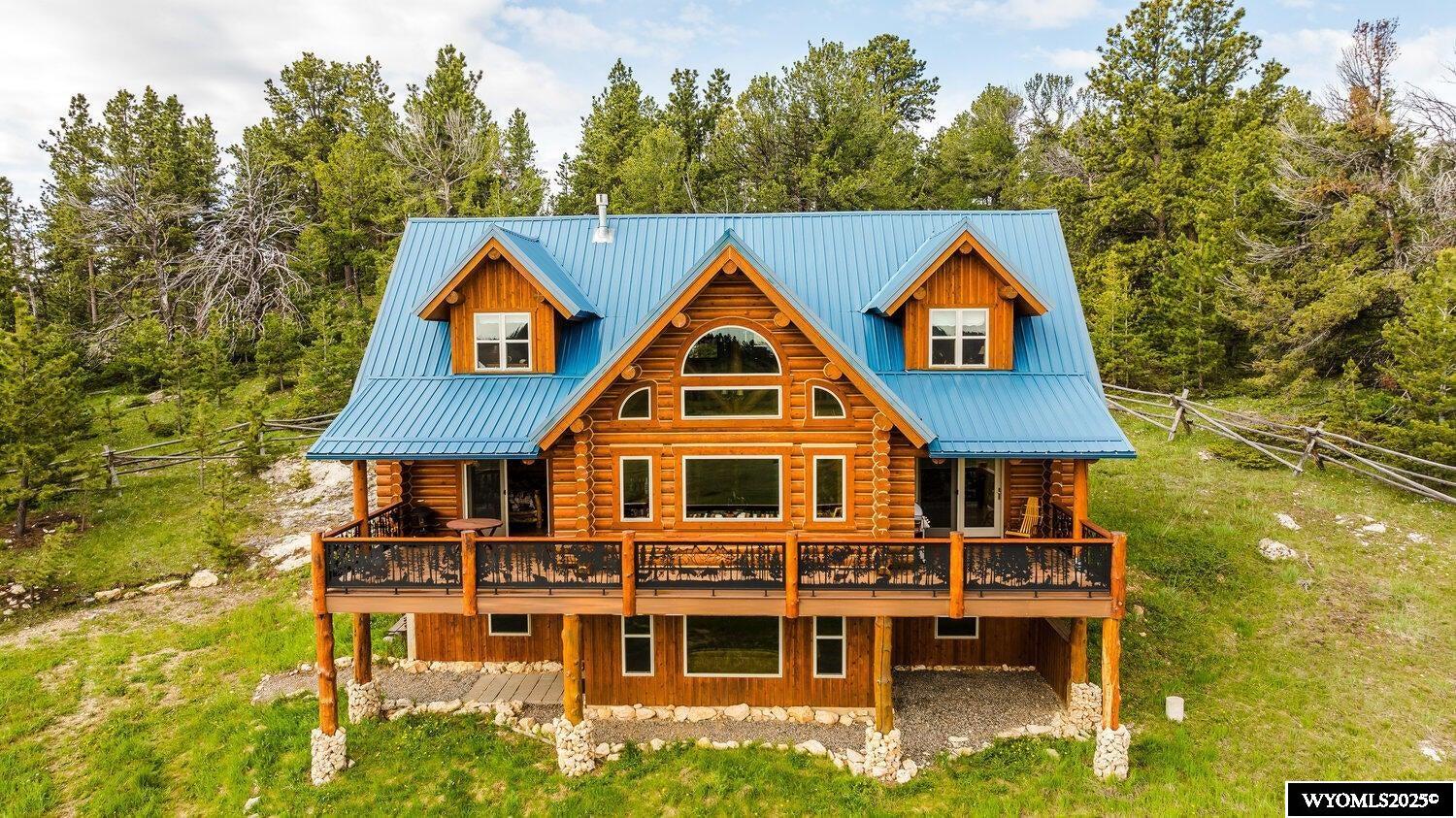 Lodge style cabin that will be certain to impress you. Walk inside to feel the charm and workmanship that went into a one of kind get away. The owners have designed and decorated this property that the word ''Cabin'' does not fit. Quality furnishings and tastefully decorated through out to welcome you in. As you enter you immediately begin to relax and enjoy. Large windows that take full advantage of the beautiful Big Horn Mountains. Hundreds of acres of BLM land adjoins the property. Lodge/ Cabin designed and furnished to sleep up to 16 guests at one time. Green meadows and tall pines, a truly scenic pleasure that must be experienced. Take your ATVs down to near by Crazy woman canyon to enjoy the breathtaking river and WY scenery. Use your canoes on Tie Hack reservoir before you hike. At the end of last summer the entire cabin had been completely re sealed and stained by brush for a great job! Any chinking that was questionable was repaired.