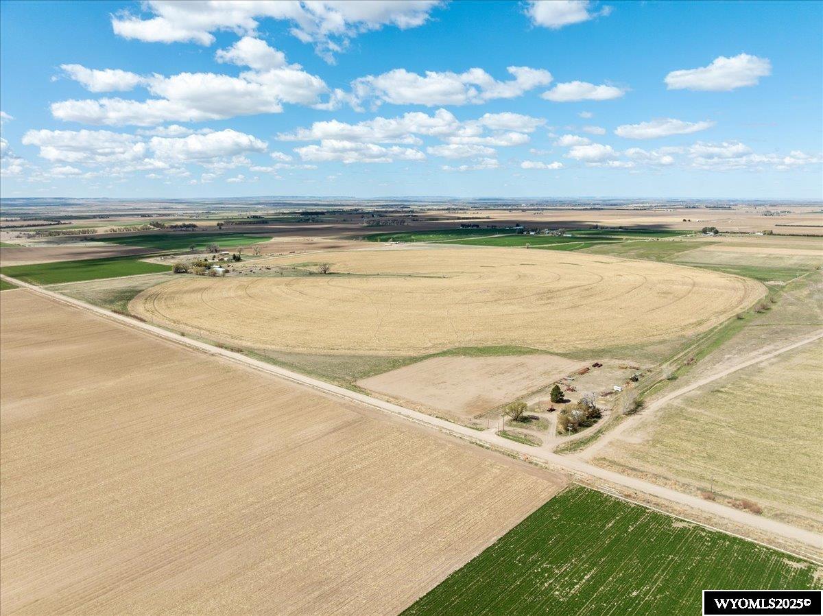 Highly Productive Irrigated Farm with Dual Water Rights – Mitchell, NE  Located in the heart of Nebraska’s ag country, this exceptional farm offers a rare opportunity to own a turn-key operation with proven performance. Consisting of prime, irrigated ground just outside of Mitchell, this property is highlighted by dual water rights, ensuring dependable water access for consistent production year after year.  At the center of the farm is a 1998 Zimmatic 7-tower pivot equipped with 38" tires replaced in 2023, and professionally serviced annually for optimal performance. With meticulous care and efficient infrastructure, this system effectively delivers water across the field.  Boasting an average yield of 5.7 tons per acre, this farm produces at a optimal level, making it ideal for alfalfa, or other high-demand crops. The combination of reliable water, well-maintained equipment, and productive soil sets this property apart as a premier ag investment or addition to any existing operation.  Don't miss this opportunity to acquire a top-tier farm in a strong agricultural region with excellent infrastructure and a strong production history.