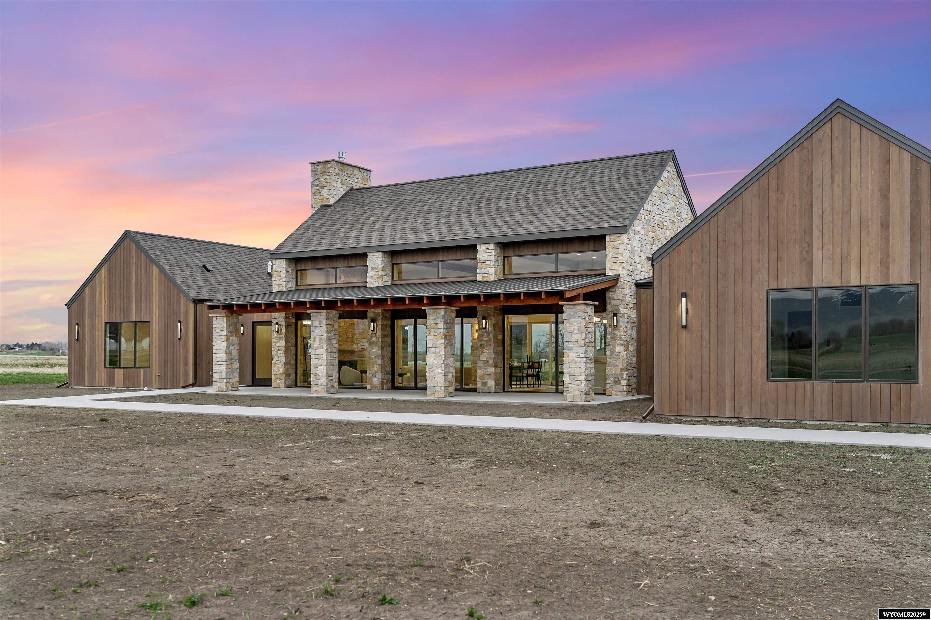 Experience the serenity of mountain luxury in this newly built custom home located in the exclusive gated community of Bobcat Estates in Sheridan, Wyoming. Situated on 5.25 acres of open space, this stunning property offers unmatched privacy and sweeping, unobstructed views of the majestic Big Horn Mountains. Crafted with exceptional attention to detail, the home features high-end finishes, soaring ceilings, and expansive windows that bring the outdoors in. The open-concept design flows effortlessly from a chef's kitchen to spacious living and dining areas—ideal for both relaxing and entertaining. Step outside to enjoy the beauty of Wyoming from your covered patios, surrounded by natural landscapes, running water and room to breathe. Bobcat Estates offers seclusion and security, just minutes from the charm of downtown Sheridan. This property has the convenience of SAWS water as well as irrigation water. This is more than a home, it's a lifestyle. Schedule your private tour today.