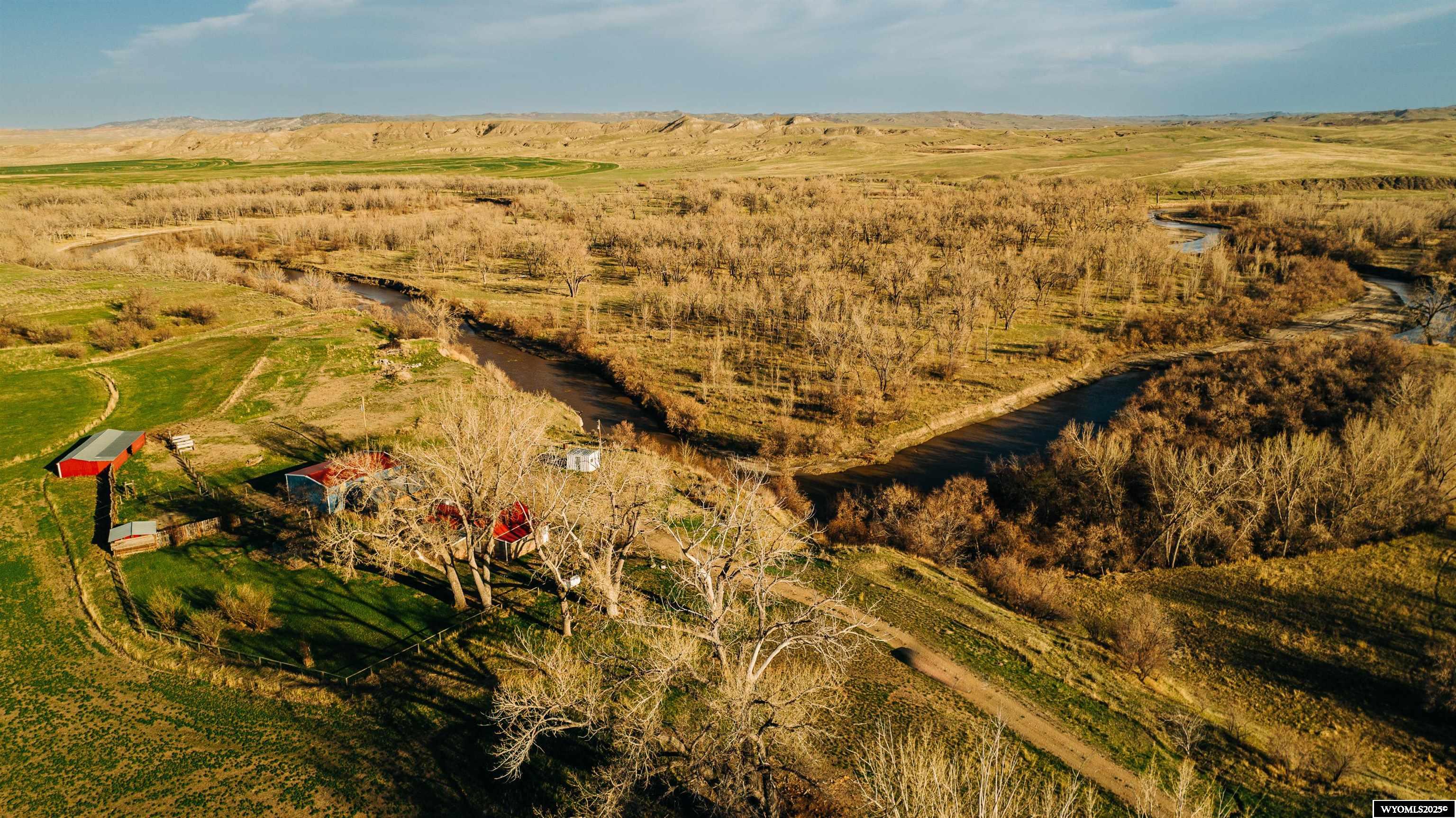 HUNTING AND FISHING PARADISE! Beautiful 327 acre ranch east of Kaycee on Sussex Road with Powder River running through it. This ranch also has a reservoir (stocked with trout) and natural springs for an over abundance of water. Approximately 100 acres to hay meadow and irrigation rights coming from the Sahara Ditch. There is a plethora of wild life which makes this ranch a hunting haven. The property consists of a nice and updated 3 bedroom, 1 bath home. The ranch outbuildings consist of a 16x30 tool shed and a 30x40 (approx.) shop plus an open face shed. The neighbor puts up a small hay crop of alfalfa and grass hay. Beautiful views. If you are looking for a hunting and fishing property or a gentleman's ranch, call Cristy Kinghorn for a viewing at 307-620-0037.