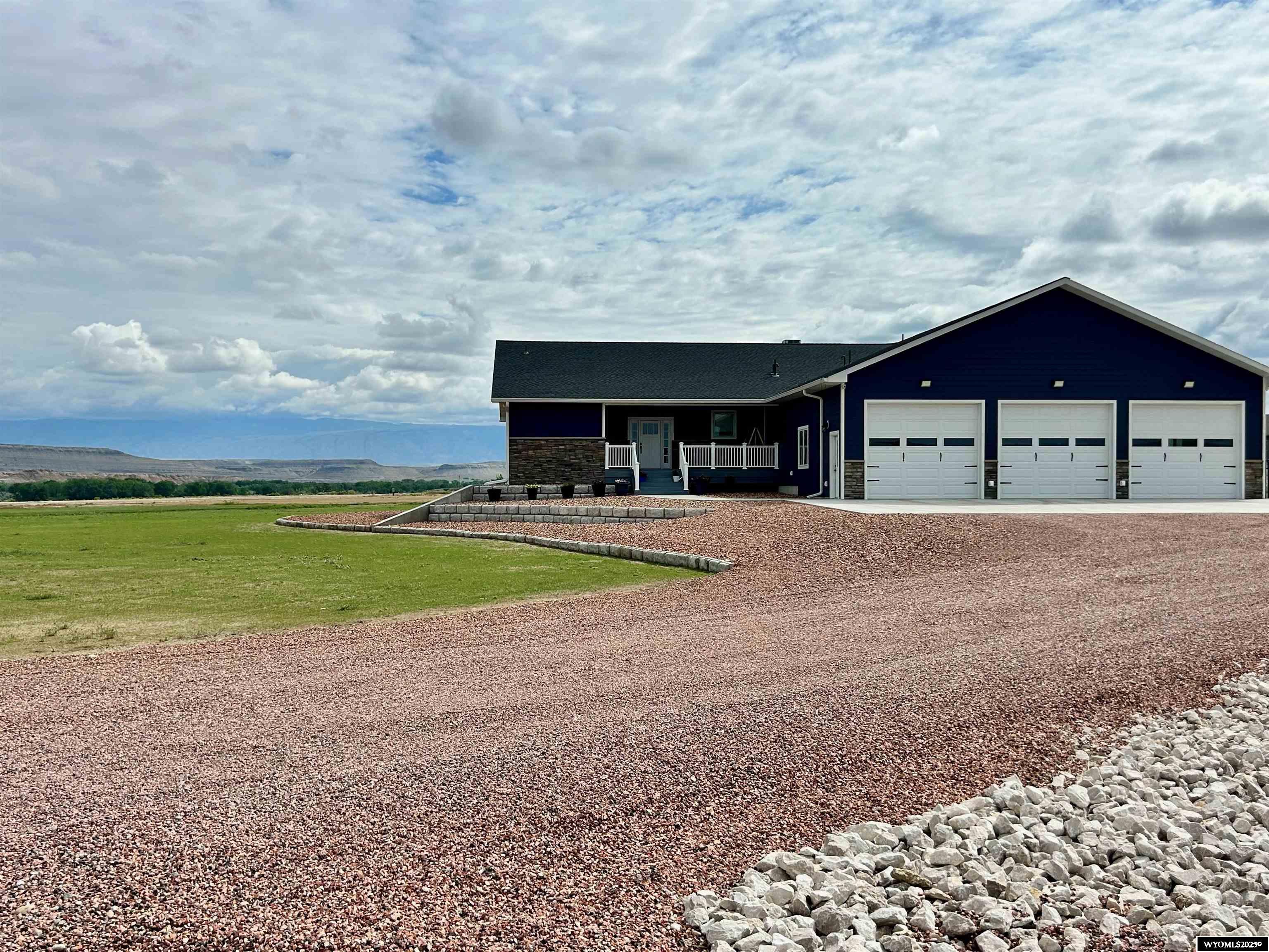 Welcome to this beautifully maintained home located in the sought-after Scharen Subdivision in Greybull, Wyoming. Set on a spacious lot with mountain views and a peaceful neighborhood atmosphere, this property offers the perfect blend of comfort, style, and functionality. Built in 2021, 4 beds, 3 1/2 baths, with over 3,000 sq feet on the main floor. The unfinished basement boasts another 3,000+ sq feet, with room to add several bedrooms, a bathroom and vault room already started, and large rec room. This home is a rare find, well built and well kept.    Inside, you'll find an inviting layout with abundant natural light, a modern kitchen, and comfortable living spaces ideal for relaxing or entertaining. The bedrooms are generously sized, and the bathrooms are clean and well-appointed. Step outside to a landscaped yard perfect for outdoor gatherings, gardening, or simply enjoying the wide-open Wyoming skies. There is a very large, attached, 3 car garage with 10' overhead doors.    Whether you're looking for your first home, a family retreat, or a quiet place to retire, this home  offers a rare combination of quality, location, and value.