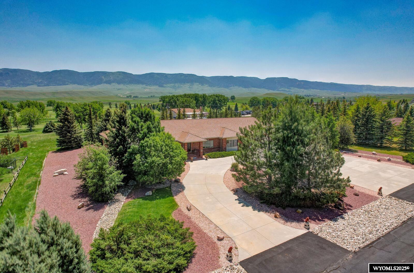 Quality One Owner Home built in 2001 by Jim Badger of Cougar Construction. Tremendous Estate Home overlooking the fairways of Casper Country Club with a view of Casper Mountain.  This custom built home has all of the upgrades on one level. As you enter the grand foyer, you will see the Formal Living and Dining Rooms, with Office area, family room with fireplace, kitchen with island area, all granite counters.  The primary suite is super large with 5 piece bathroom, granite counters, tile floors.  2 other generous sized bedrooms close with Laundry area between them all.  Huge garage that will can fit all of your toys. Wonderful layout with great views.   Call or Text Paul Wilhelm at 307-259-9287 for your personal tour.