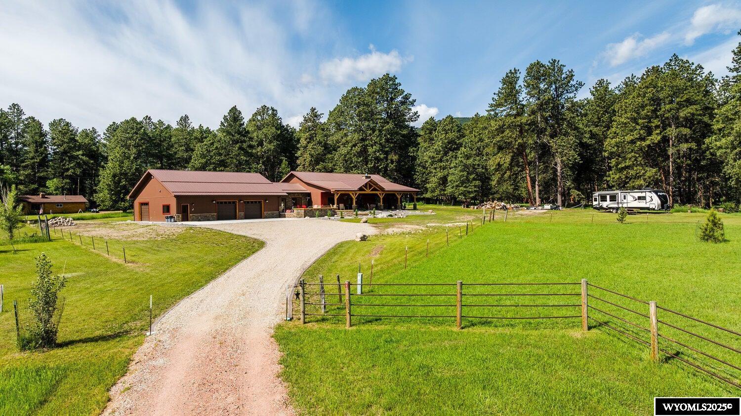 This property is so Energy Efficient and Beautifully designed. Insulated Concrete Construction with 10ft ceilings, hard wood floors and large open floor plan. Over 3000 sqft of quality, comfort with detailed design through out. 3 large bedrooms and 2 large bathrooms. Relax at any of the 3 separate covered patios plus an open built in fire pit area that is all concrete. 2000 sqft heated garage and office area with 3 separate garage doors. Out in back yard, is a 432 sqft work shop area with power and concrete floors and a garage door. To the right of the house is a large RV parking area with 30/50 amp service, water and sewer right there. All of this and more on 2 acres at the end of the road. Property Highlight Features Are: Viking Duel Fuel Range and Dishwasher, Microwave Drawer
