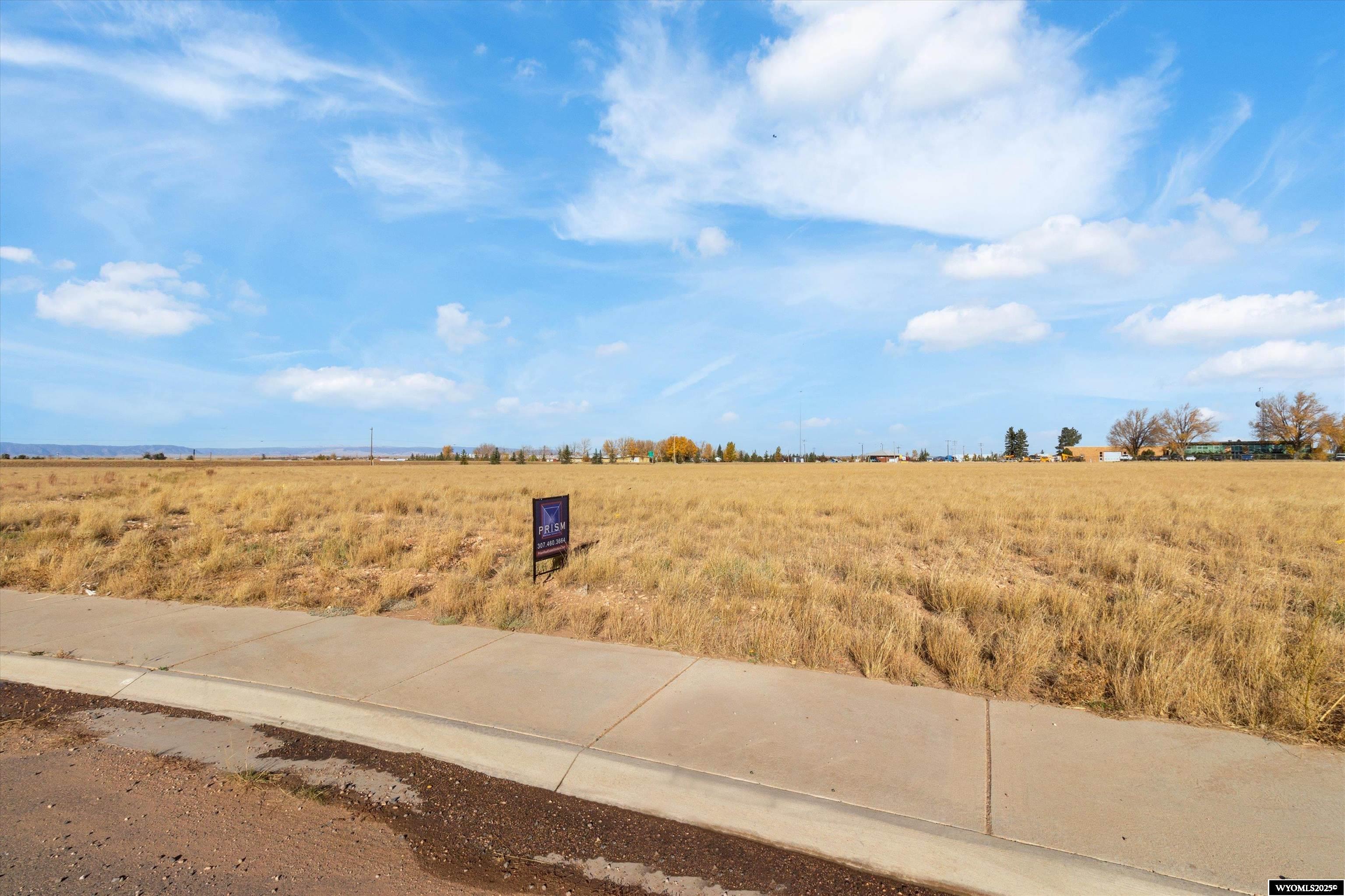 Set your business up for success with this well-positioned 9.03 acre commercial lot in the highly regarded Timberline Business Park. Priced at $1,200,095 this shovel-ready parcel (B1 L7) offers an outstanding opportunity to bring your industrial or commercial vision to life.  With utilities and site improvements already in place, the property is ideally suited for a wide range of business types, including construction, healthcare, technology, manufacturing, education, energy, food production, retail, transportation, telecommunications, and more.  Benefit from a strategic location within a growing commercial hub, designed to support both established enterprises and emerging ventures.  Don’t miss your chance to secure a valuable footprint in one of Laramie’s premier business parks.  Listed and marketed by Prism Real Estate Solutions Contact us at 307-460-3664 for more details or to schedule a private tour.