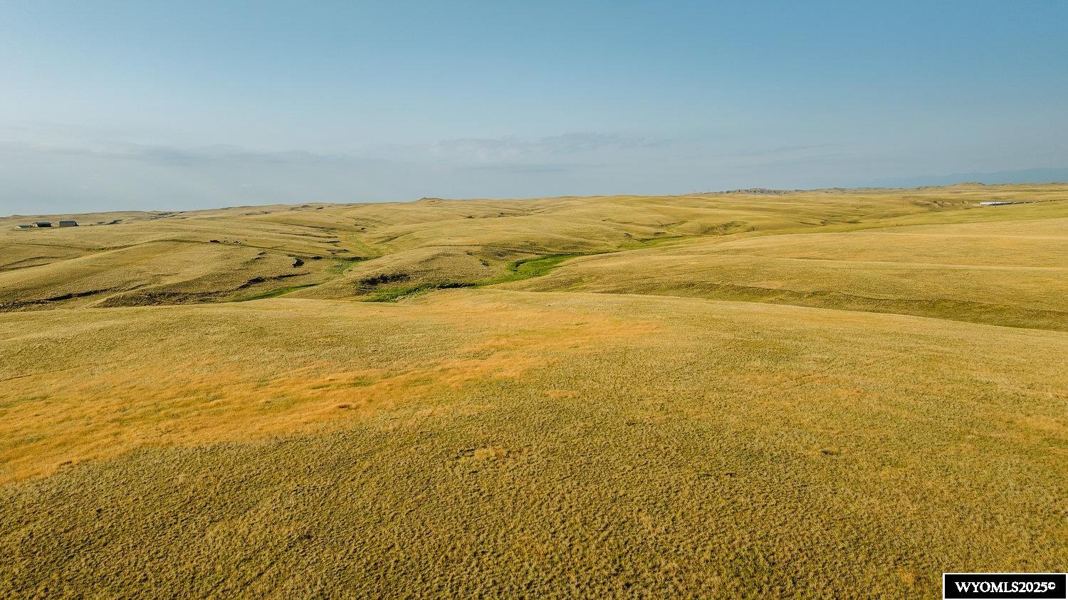 160 acres 10 minutes south of Buffalo offering stunning mountain views and endless possibilities. This expansive property features multiple prime building sites, power near by, a natural ground spring, and plenty of room for livestock. Whether you're looking for a private retreat, grazing land, or the perfect spot to build your dream home, this acreage delivers peace, space, and wide-open Wyoming beauty. This property is also being offered as two 80 acre parcels.