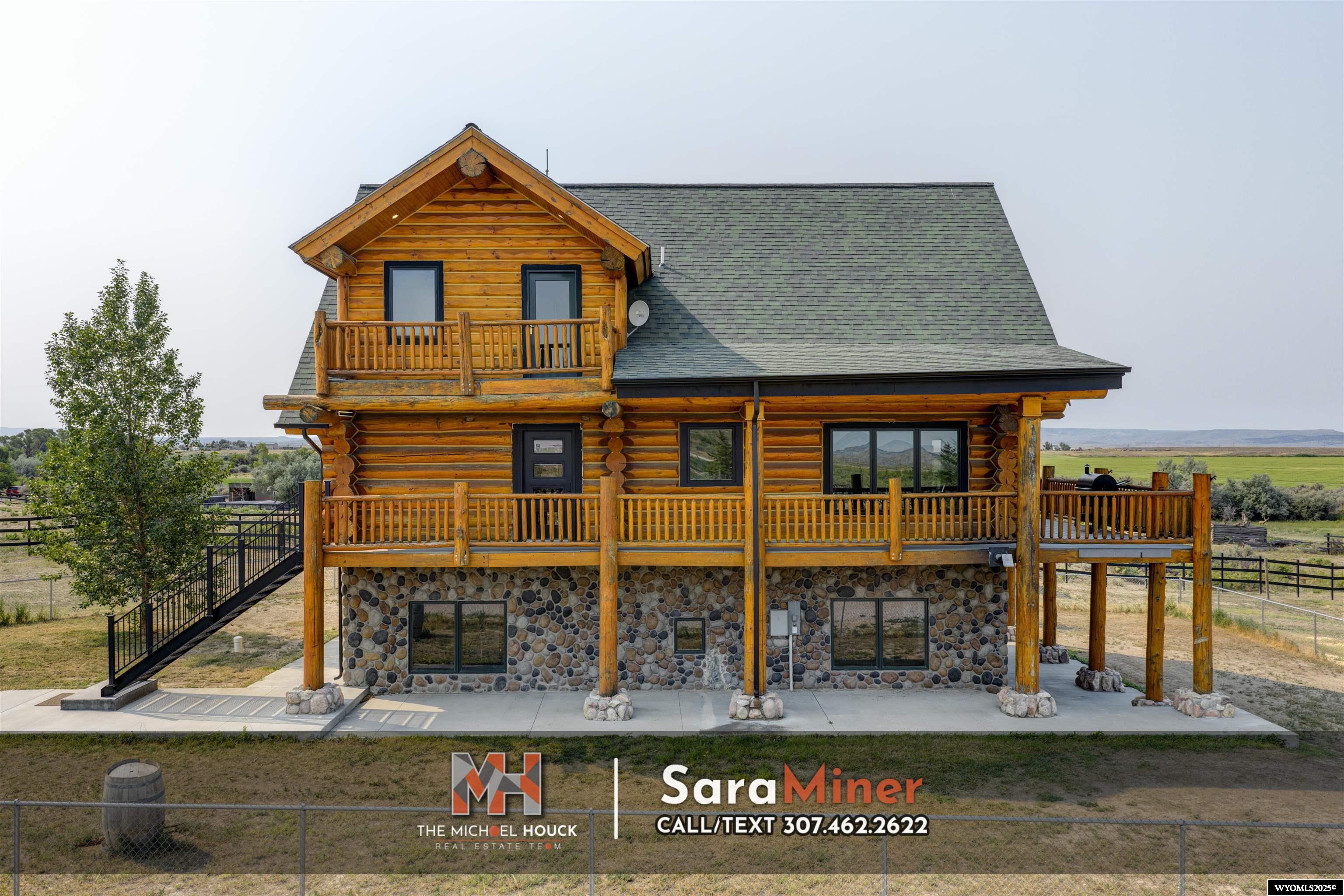 Welcome to your Wyoming retreat—where rustic charm meets modern comfort. This beautifully updated 4-bedroom, 3-bath log home sits on 17.8 fenced acres, offering wide-open views, room to roam, and thoughtful upgrades throughout. Inside, you'll find 2,910 sq ft of living space with fresh interior paint, new flooring,  fully remodeled bathrooms , new windows and doors. The spacious great room showcases soaring ceilings, custom woodwork, and panoramic windows that bring the outdoors in. Step outside to enjoy the peaceful setting, complete with a 3-car garage, classic barn, multiple pastures, and a private pond. Whether you're seeking a working ranch, hobby farm, or serene escape, this property delivers space, function, and unmatched Wyoming beauty. Call/text The Michael Houck Real Estate Team for more info or take your own private tour. 307-462-2622