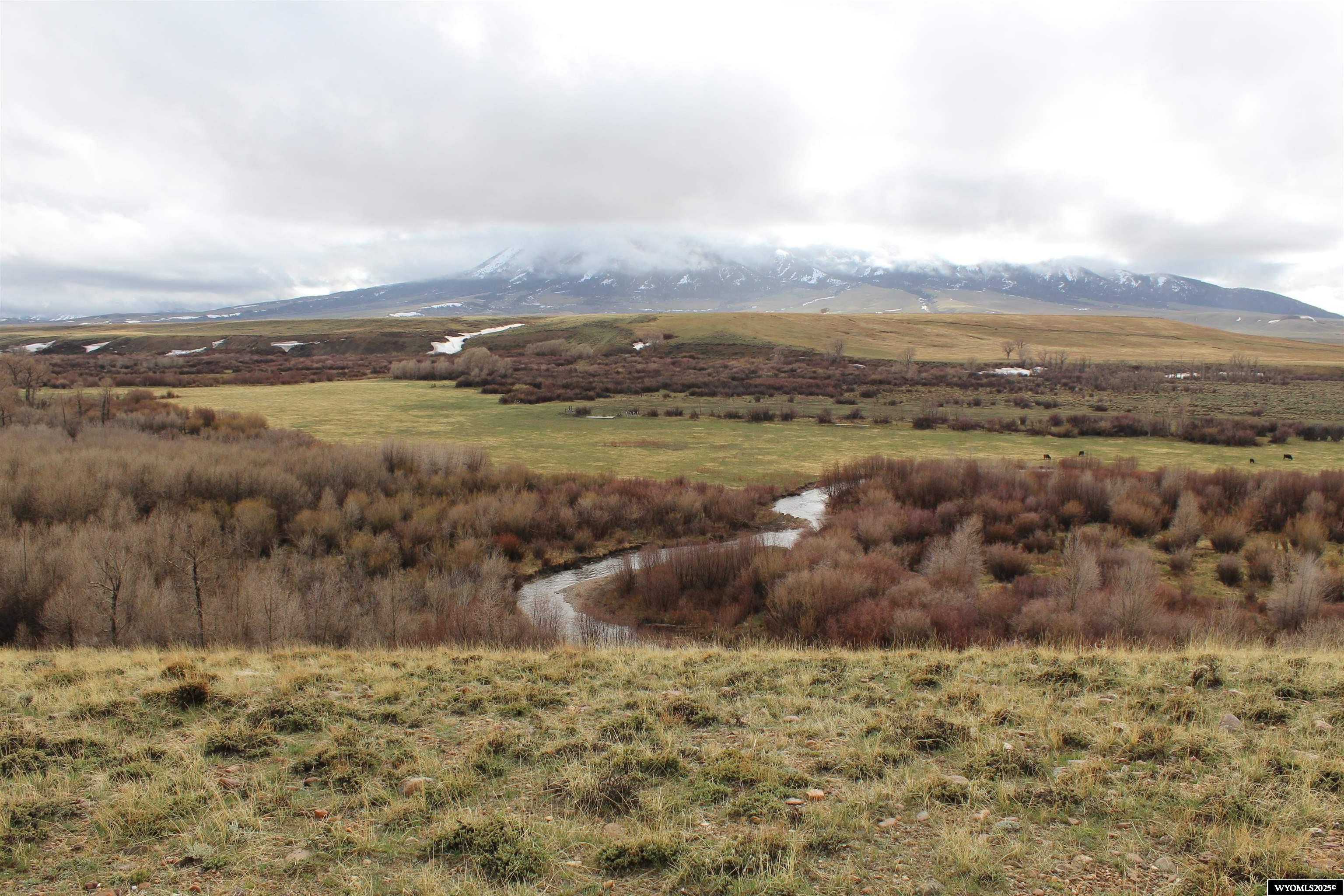 The Menke Ranch offering is located approximately 1.5 miles south east of Elk Mountain, Carbon County, Wyoming. The ranch encompasses 4,605.3± total acres, consisting of: 1,690± irrigated acres, 2,275.2± pasture acres, 640± acres of State Lease land. This property is a working cattle ranch whose features include flood irrigated hay land with timothy grass hay, irrigated pasture land, sub-irrigated river bottoms, rangeland pasture, and a homestead. The property is traversed by O’Mara Creek and the Medicine Bow River, providing excellent water resources. The current owners run cow/calf pairs, but it could be a yearling operation. The flood irrigated ground produces an approximate yield of 2 tons per acre. The ranch headquarters are located in Section 32 along the east bank of the Medicine Bow River and feature, a modest two-bedroom ranch home, oversized heated two-car garage with meat locker and running water, large partially heated shop with equipment storage, and several older outbuildings. Fencing and cross-fencing consists primarily of four-strand barbed wire (no guarantee of fence line location). In addition to being a working ranch, the property offers excellent recreational opportunities including approximately 1 mile of Yellow Ribbon trout stream frontage, big game and bird hunting, and easy access to the Medicine Bow-Routt National Forest to the south. Additional income to the property include the presence of a small oil and gas lease and an operational cell tower.