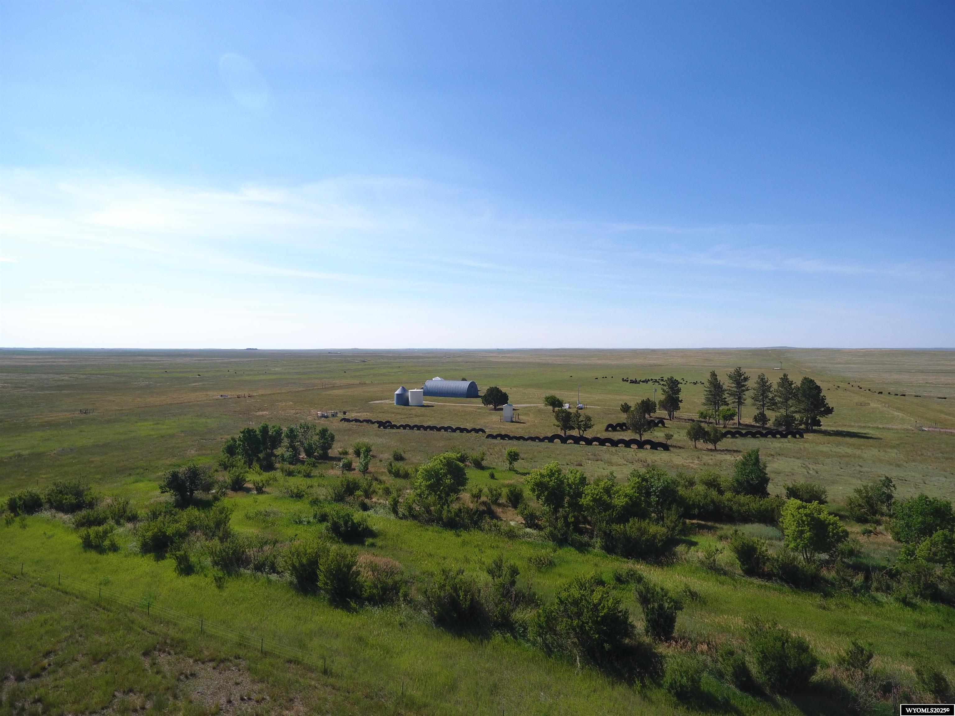 This is a 920 acre ranch located 11 miles for Lusk WY.. The home is a single wide modular home. It has 6 inch side walls and well insulated (electric).  It is in like new state. There is a Quonset (2360 Sq. ft. with an all cement floor. Five working wells (2 electric, 2 wind mills, 1 solar well. The fences are all 5 strand barbed wire perimeter fences. 4 strand interior fences. There is a well maintained treed windbreak around the improvements. The grass is well turfed over with a combination of cool season and warm season native grasses.  Probably one of the most productive ranches on a per acre basis.