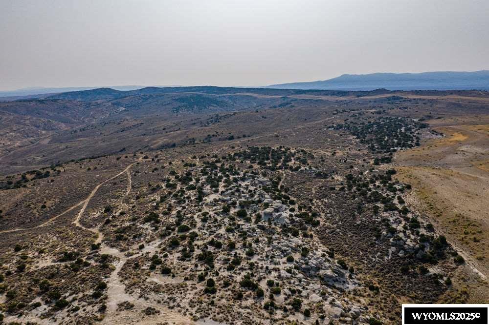Half a section of land (320 acres) located south of Rock Springs. Beautiful views and landscape surround the entire area. Local habitat supports deer, antelope, occasional elk, and numerous birds of prey. Numerous possibilities exist for potential buyer.