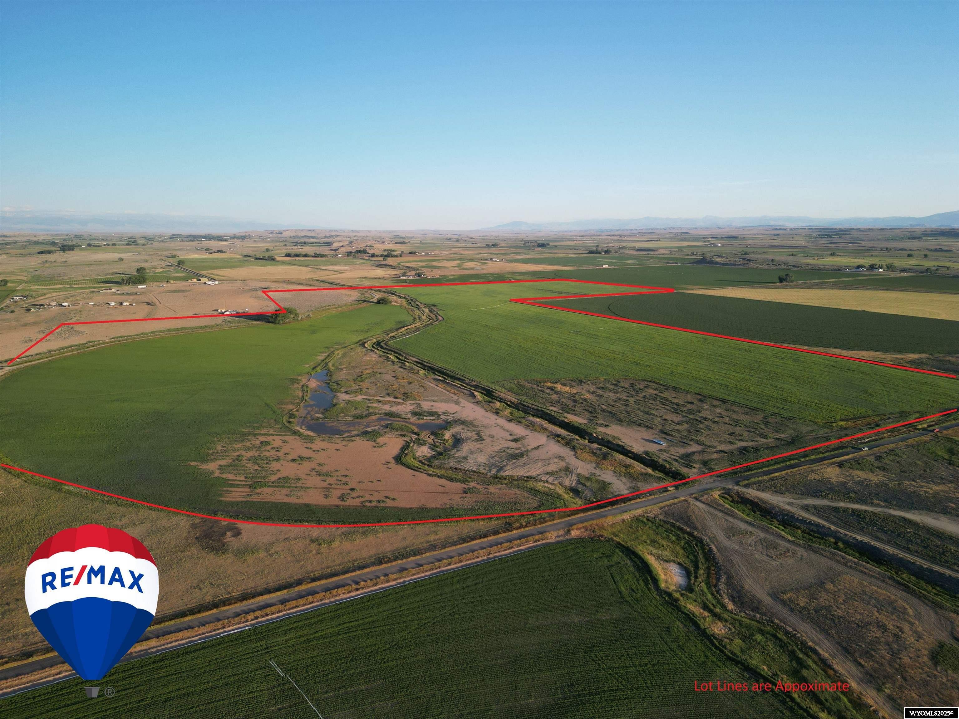 Here’s the Large Irrigated Farm You’ve Been Waiting For! Currently planted in oats, this well-maintained and highly-productive property is ready to generate years of income for its next owner. Most of the soils are the sought-after Five Mile Silty Clay Loam with gentle 0–6% slopes, ideal for producing a variety of crops. Over the past two years, the farm has been planted in sorghum and oats, with a strong history of alfalfa production as well. Water is supplied through Midvale Irrigation at approximately \$4,200 per year,and all gated pipe and irrigation equipment are included in the sale. A year-round water drain runs through the center of the property, providing reliable winter livestock water. The location offers breathtaking views—catch the southern tip of the Big Horn Mountains and gaze west to the stunning Wind River range. This contiguous parcel qualifies for landowner permits. Plus, it’s a haven for pheasants and waterfowl, making it an excellent choice for both farming and recreation. Don’t miss this rare opportunity—call or text **Skye Coleman-Weisz** today to schedule your private showing of this productive, scenic farm!